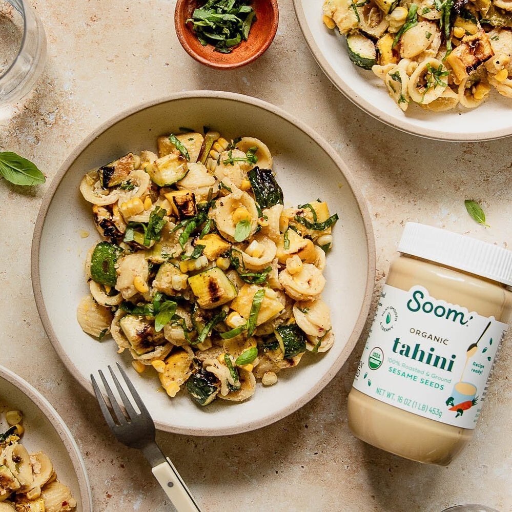 Zucchini pasta salad with orecchiette, corn, lemon tahini vinaigrette from @soomfoods 

&ldquo;This pasta salad is calling on all those late summer veggies! Zucchini, yellow summer squash, corn, and scallions take on a little char from the grill befo