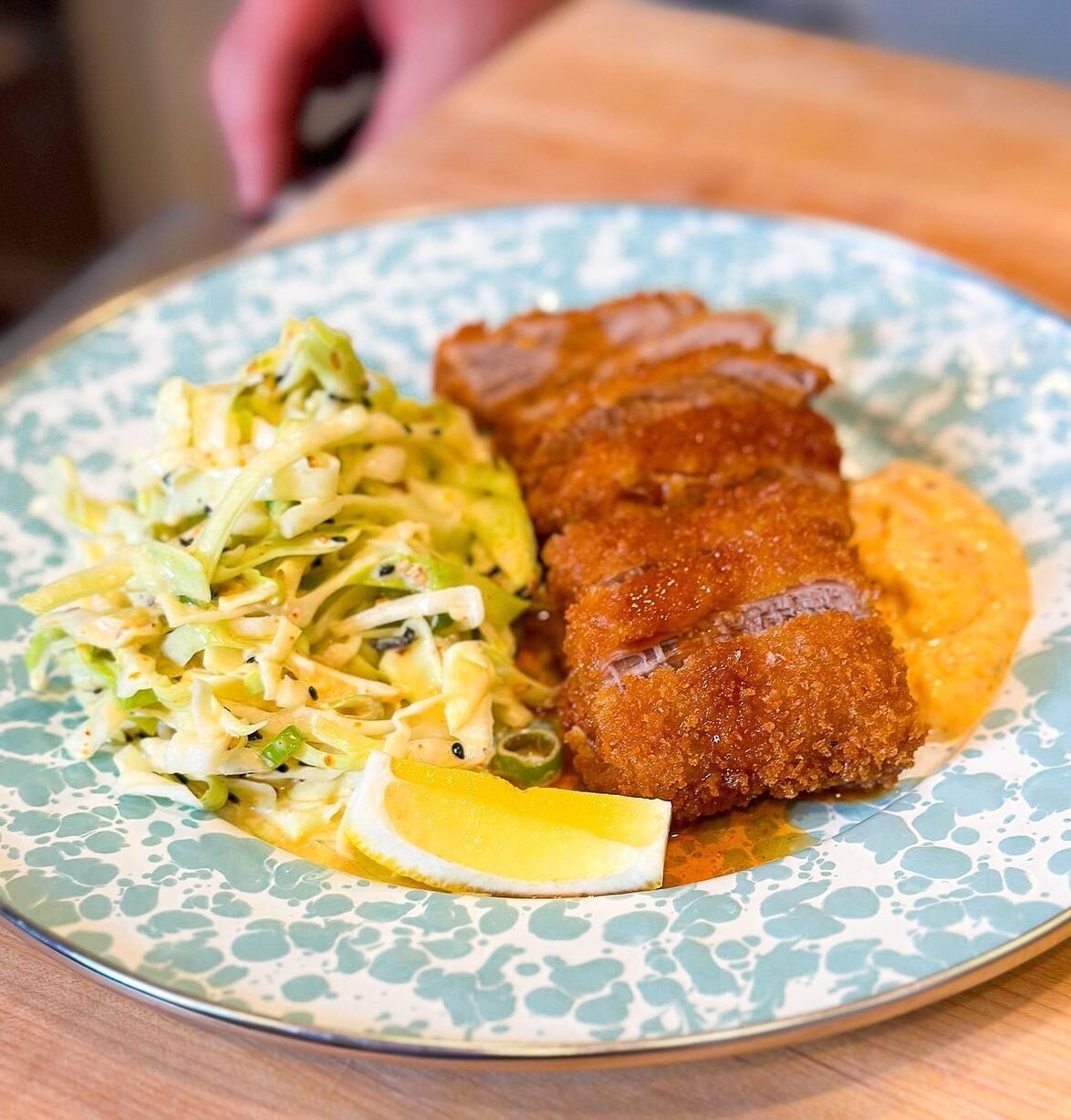 Pork Kastu with chili crunch aioli. The cabbage also got tossed with a little bit of the aioli that we made with @homiahfoods seaweed sambal chili crunch. Learn how to make this from Chef Chris Teigland @christopherteigland of @glodenver as part of a