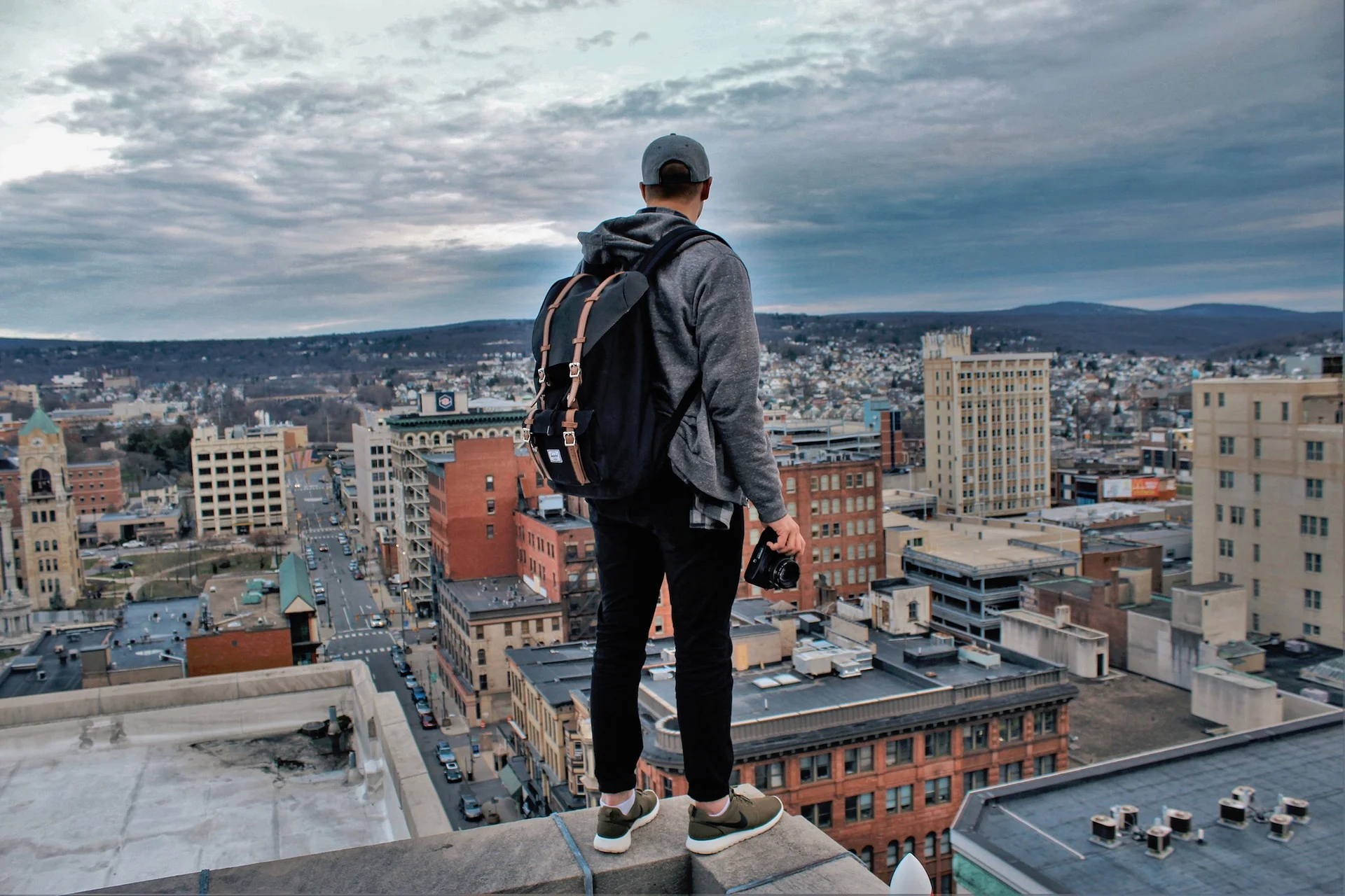 man looking over city.jpg