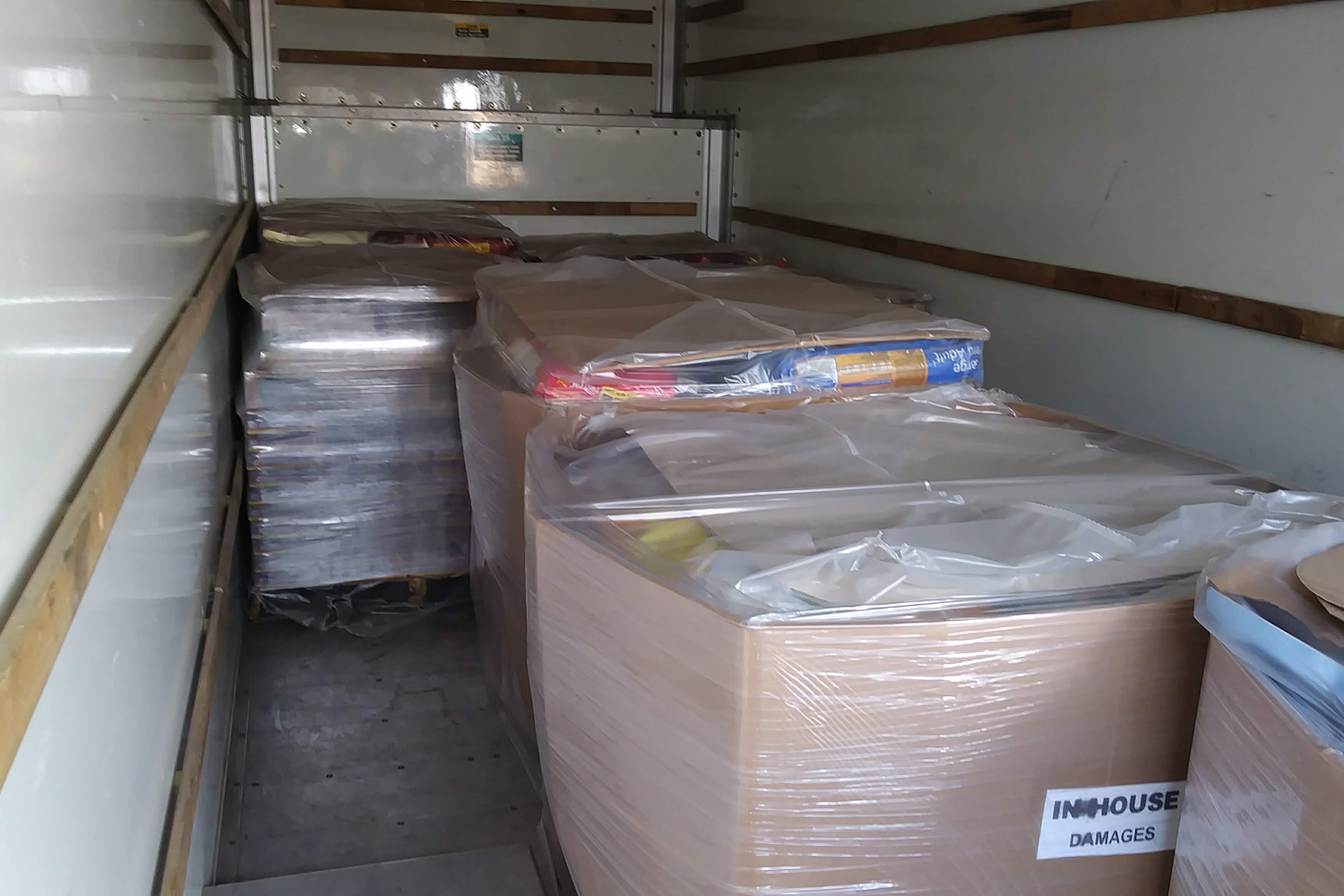 Palettes of Kibble Donated to HDW by Pet Supply Co.