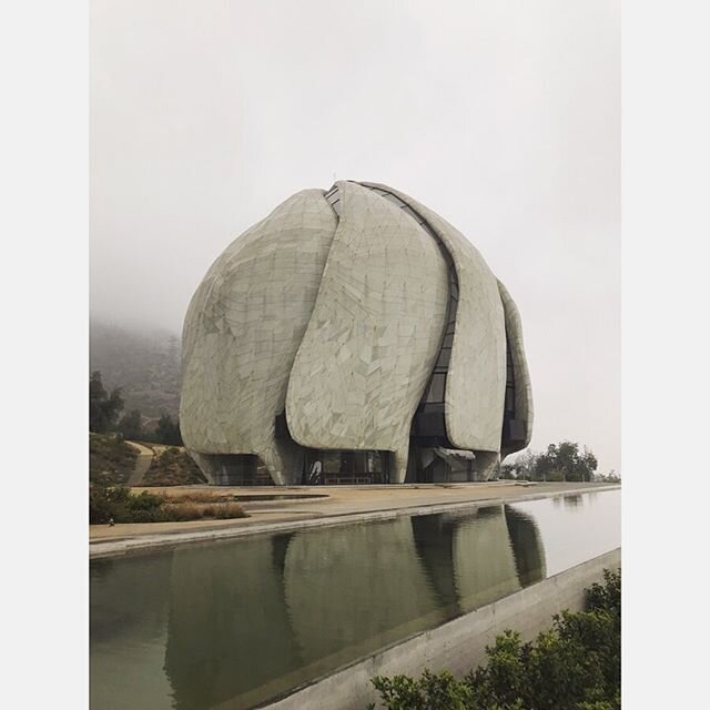 Temple Baha&rsquo;i - Santiago, Chile - April 2019 - The folded pedals and radial geometry of the temple&rsquo;s structure contrast with the asymmetry of warm wooden and leather interior surfaces. The slow curving mountain paths meander to views of S