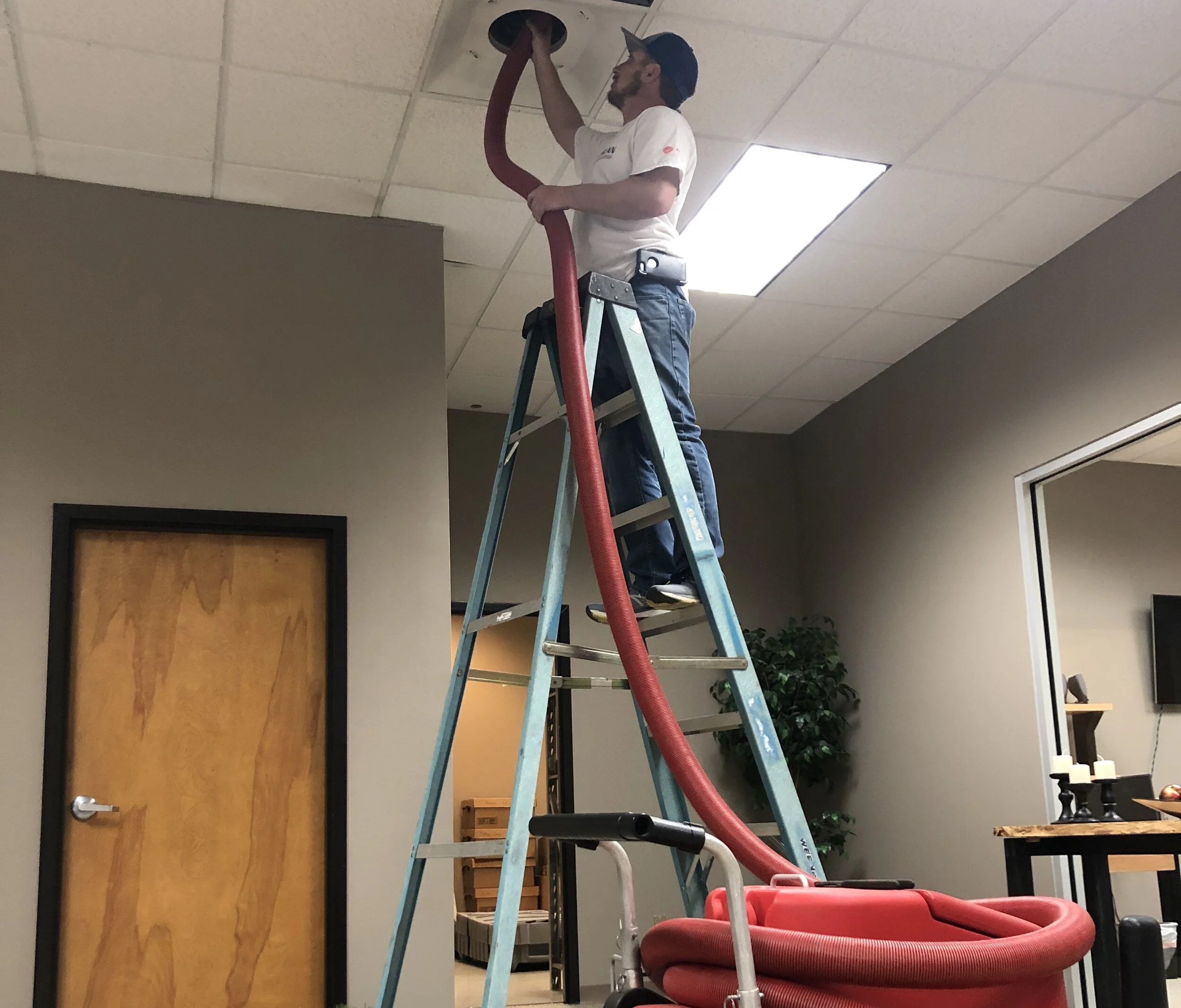 DEREK CLEANING THE ENTIRE DUCT SYSTEM AT A COMMERCIAL OFFICE BUILDING