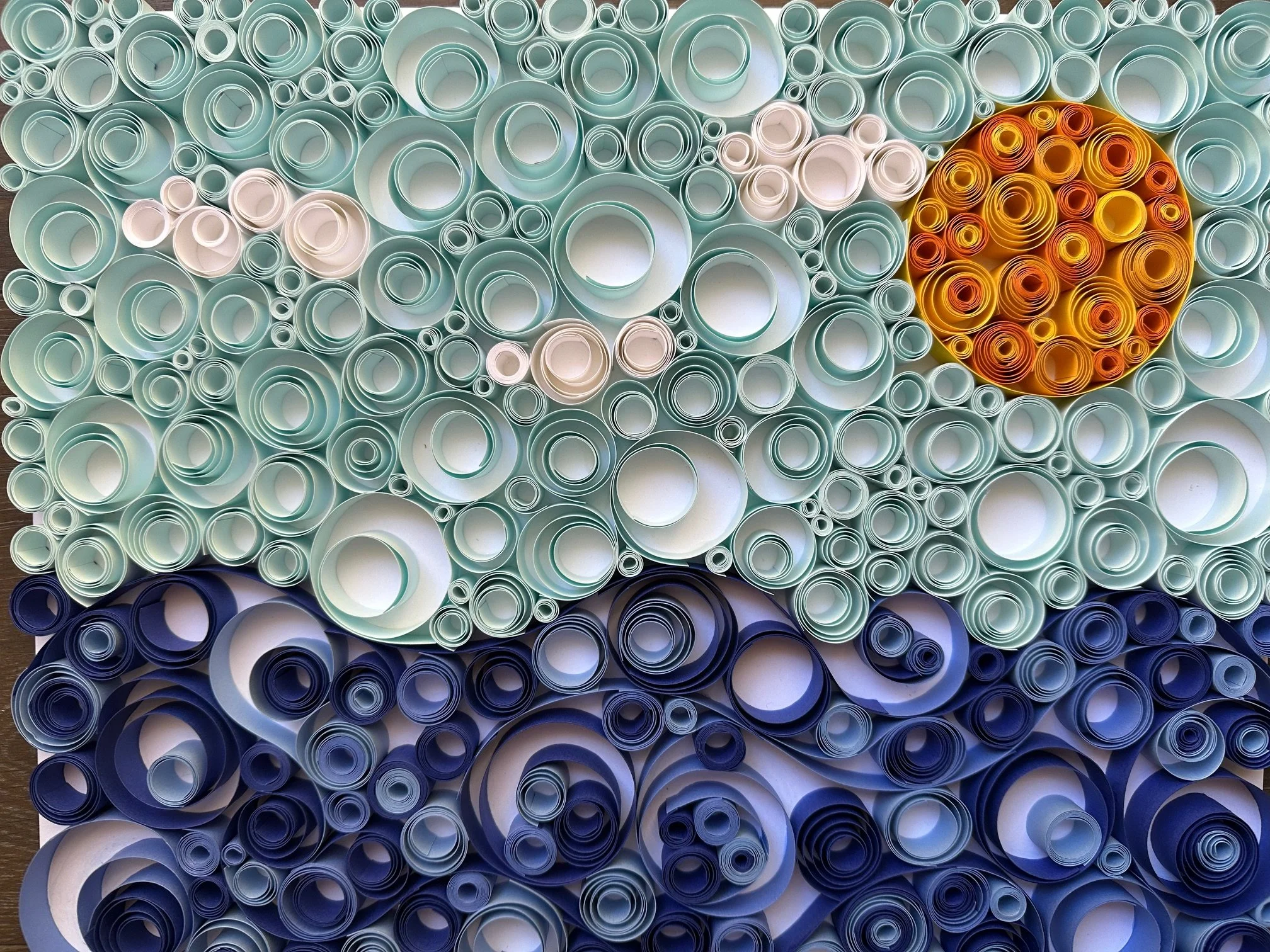 J MODERNIST - OCEAN SUN CLOUDS Tight Shot.jpg