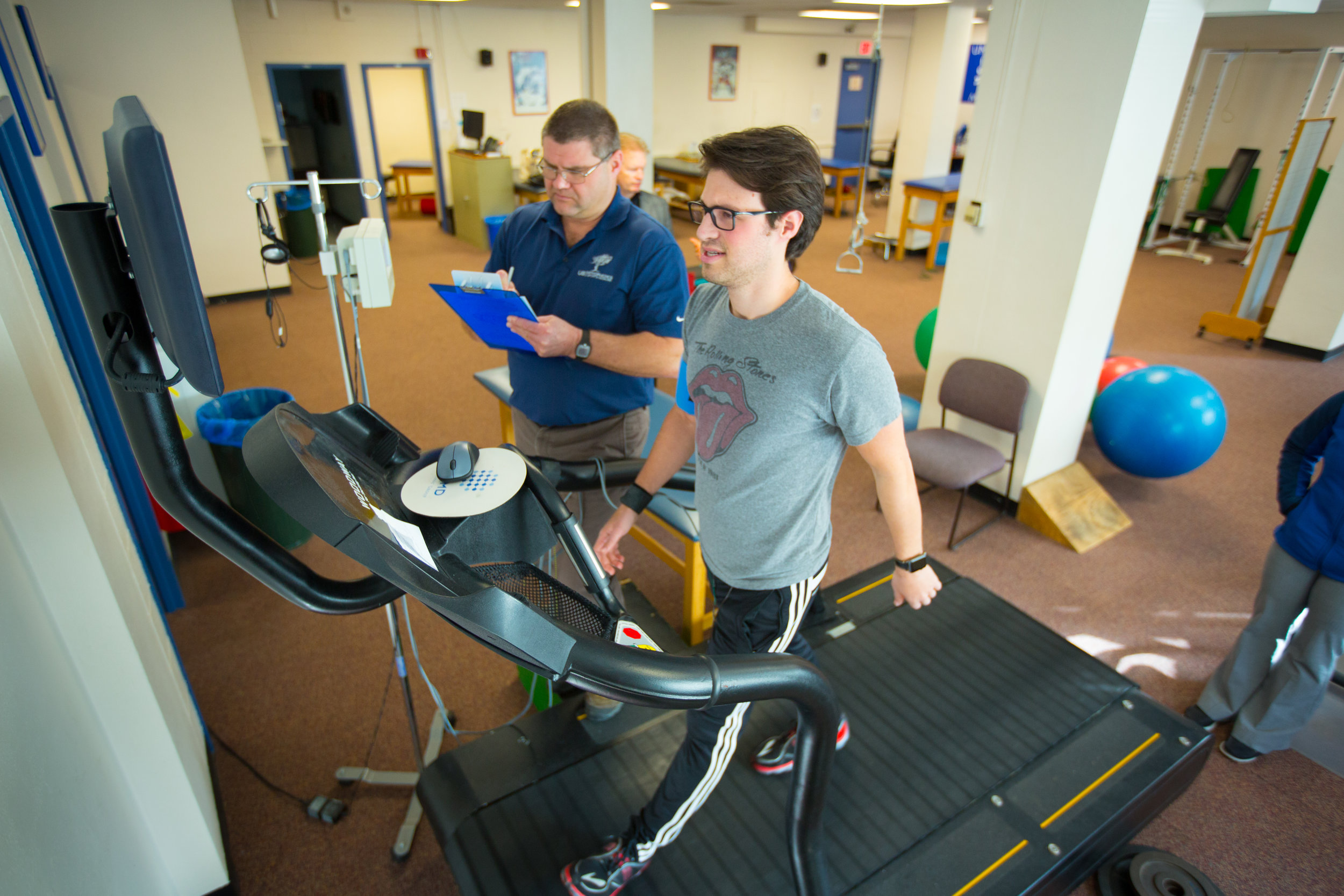  Sports Medicine Doctor John Leddy with Patient in the Sports Medicine Clinic on the UB South Campus in Farber Hall 