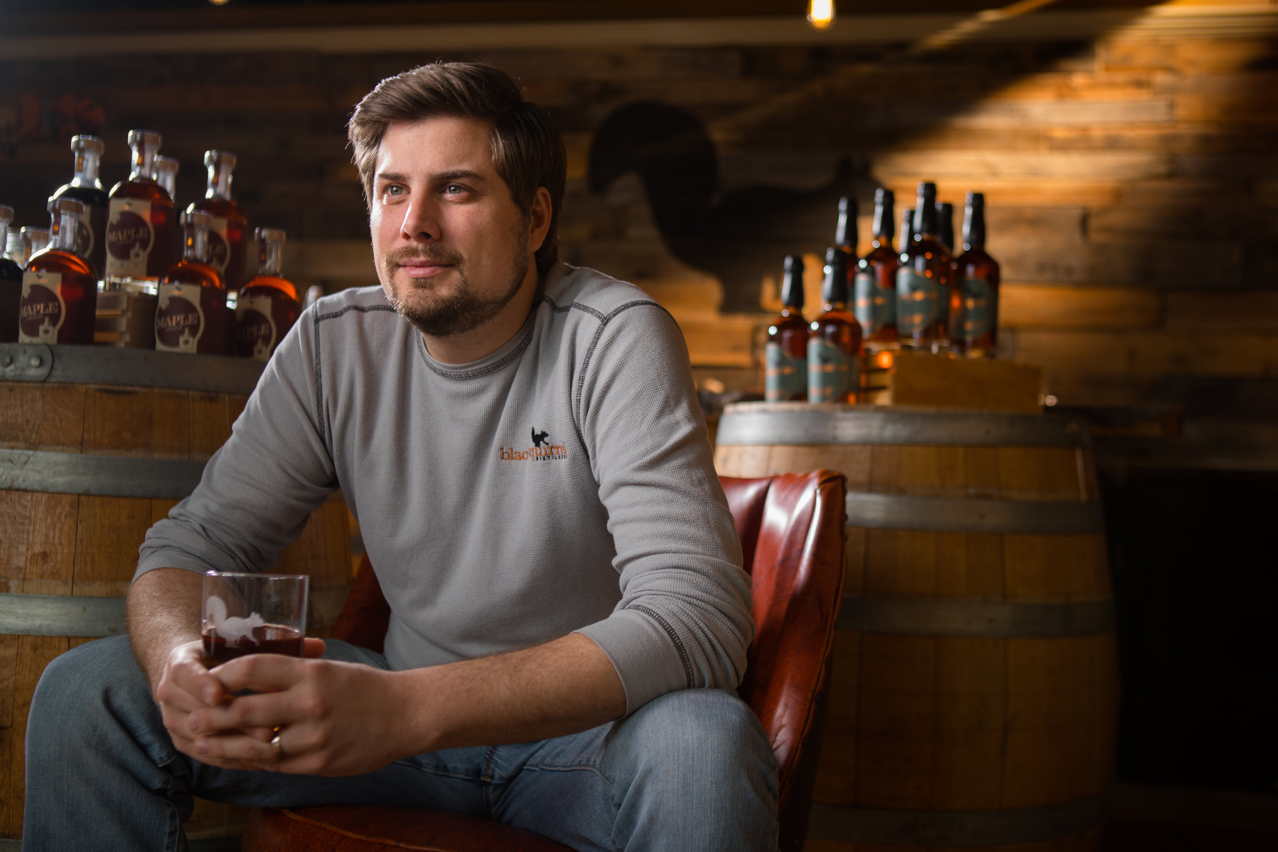  Environmental portrait of Matt Pelkey, of Black Squirrel Distillery in Buffalo, NY.  