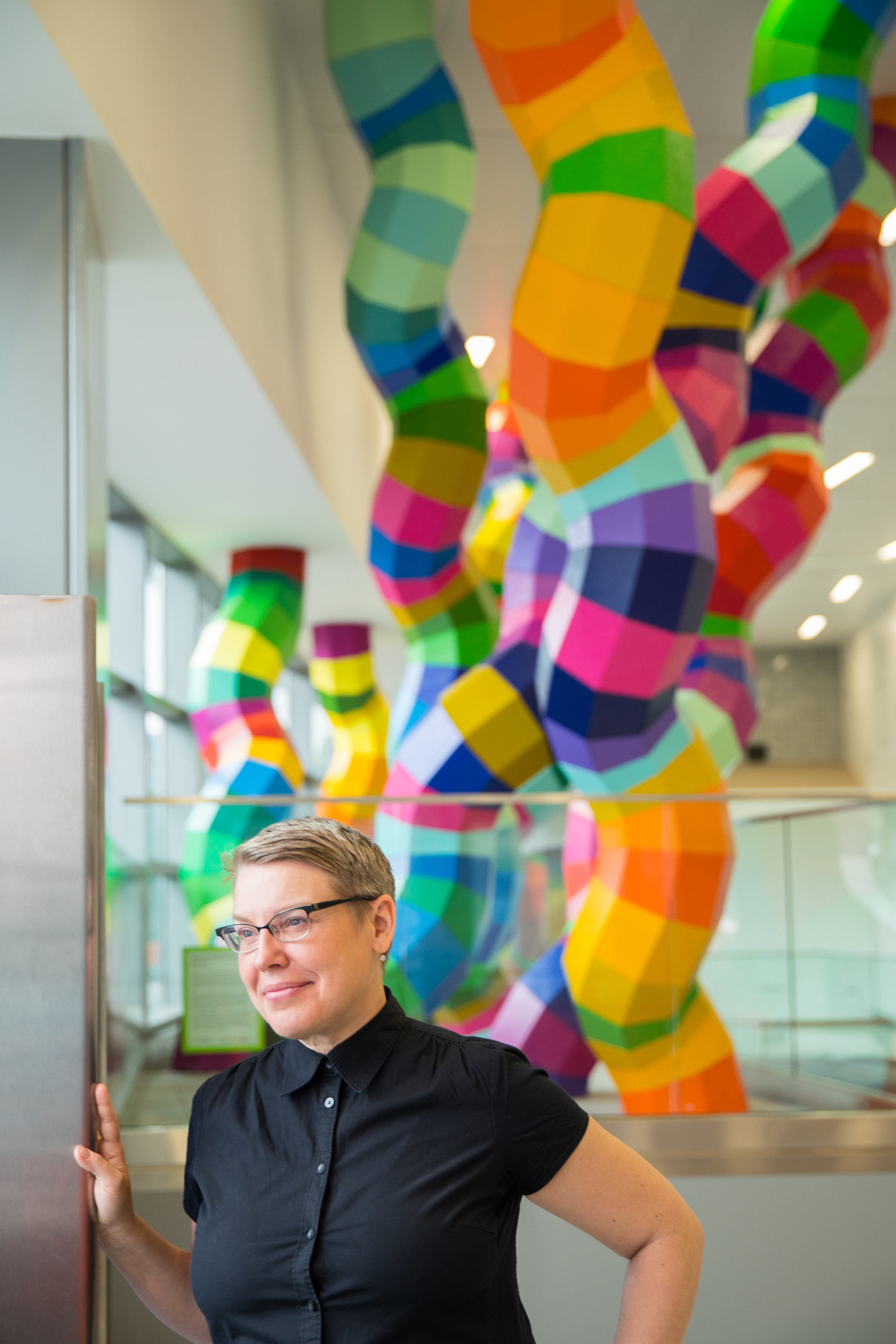  Photos of UB Faculty and Alumni, Shasti O'Leary Soundant, with her sculpture, Gut Flora at the UB Medical School Building  