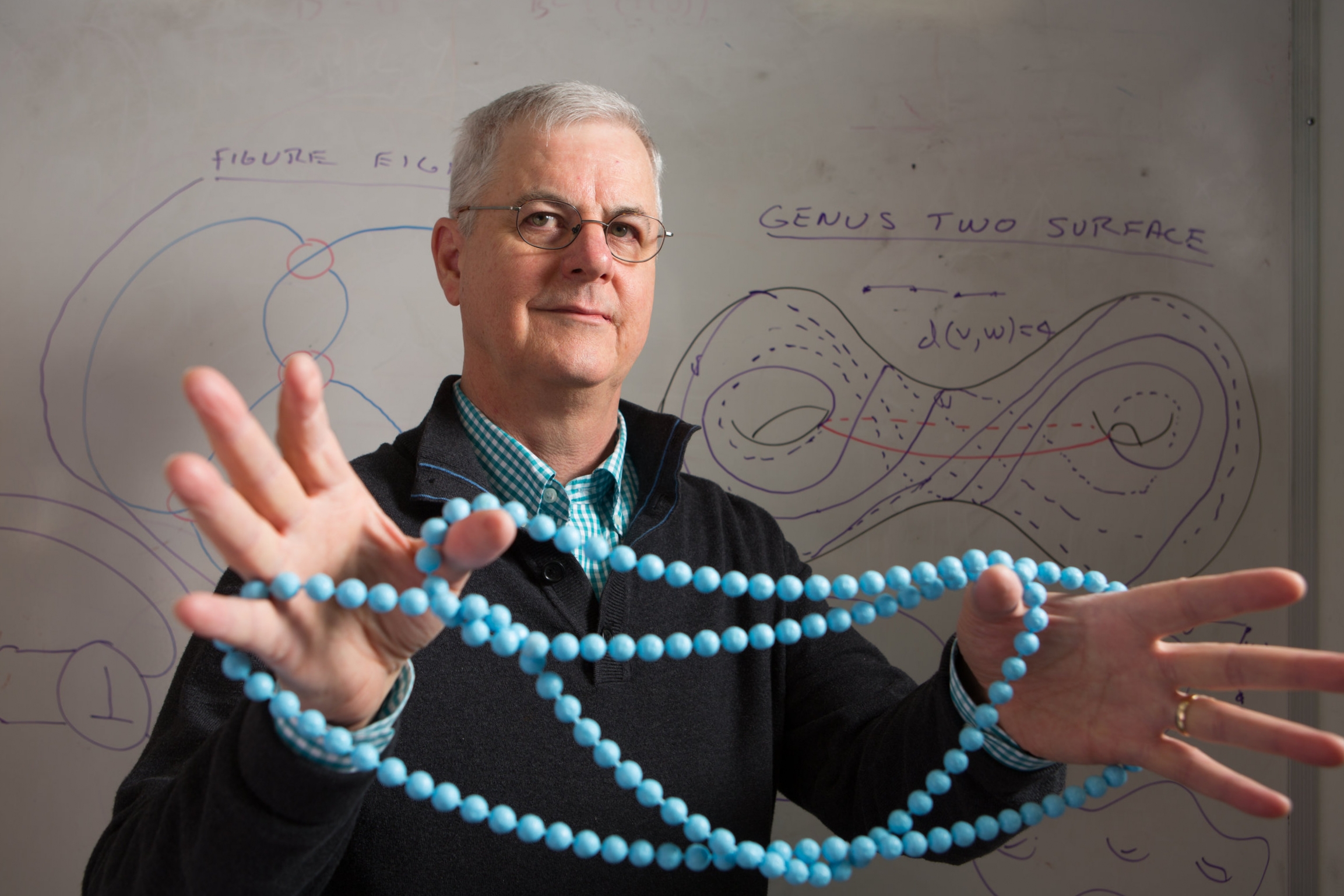 Mathematics Professor William Menasco in his Mathematics Building Office