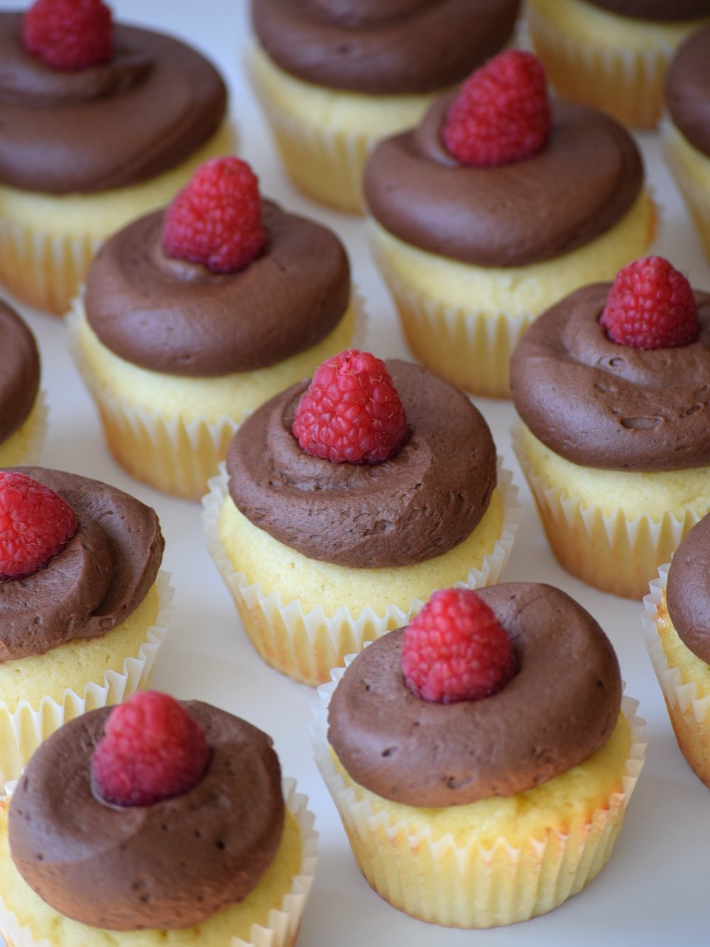 Vanilla Raspberry-Filled Cupcakes with Chocolate Cream Cheese Frosting