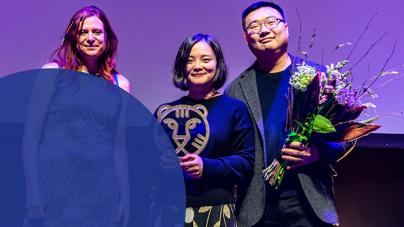 Susanna Nicchiarelli, jury member, hands out the 2019 IFFR Tiger Award to filmmaker Zhu Shengze and her producer Zhengfang Yang