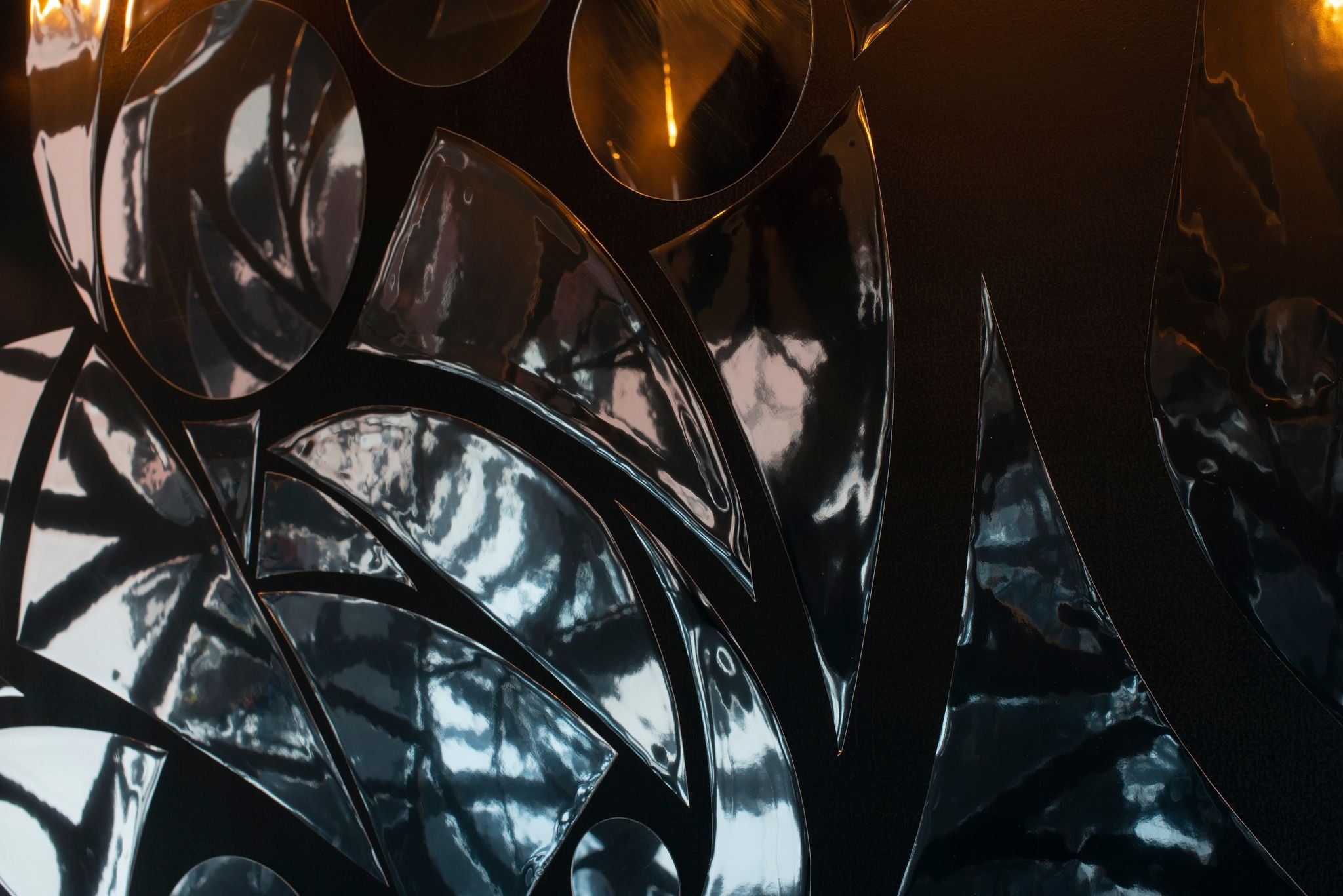 I see pieces of mirrors that mirror each other.
