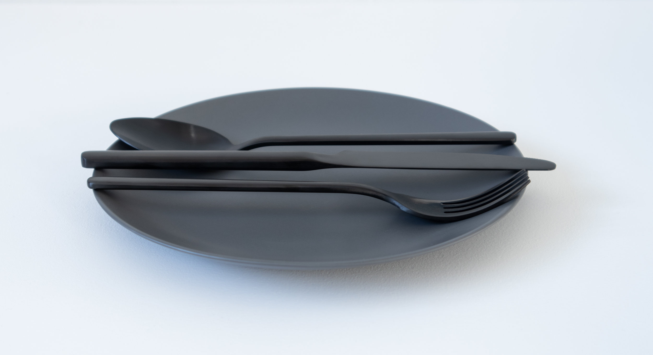 black dinnerware and cutlery, flatlay  5.jpg