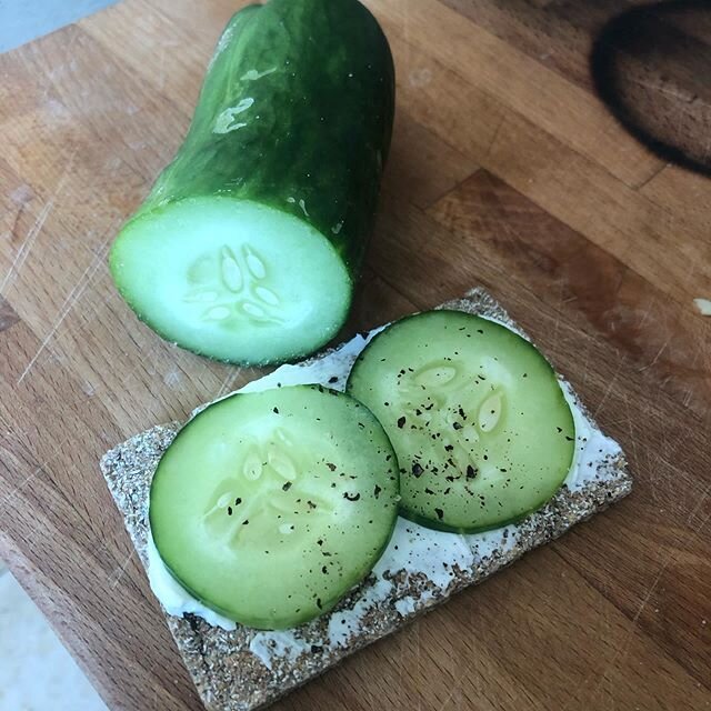 When lockdown started Mr Jennings made some vegetable beds. This is our first cucumber. It is extremely tasty. I&rsquo;m eating it for lunch. With goat&rsquo;s cheese. Also that&rsquo;s pepper not dirt. Are we actual farmers now?! .
.
.
#lunchtime #c