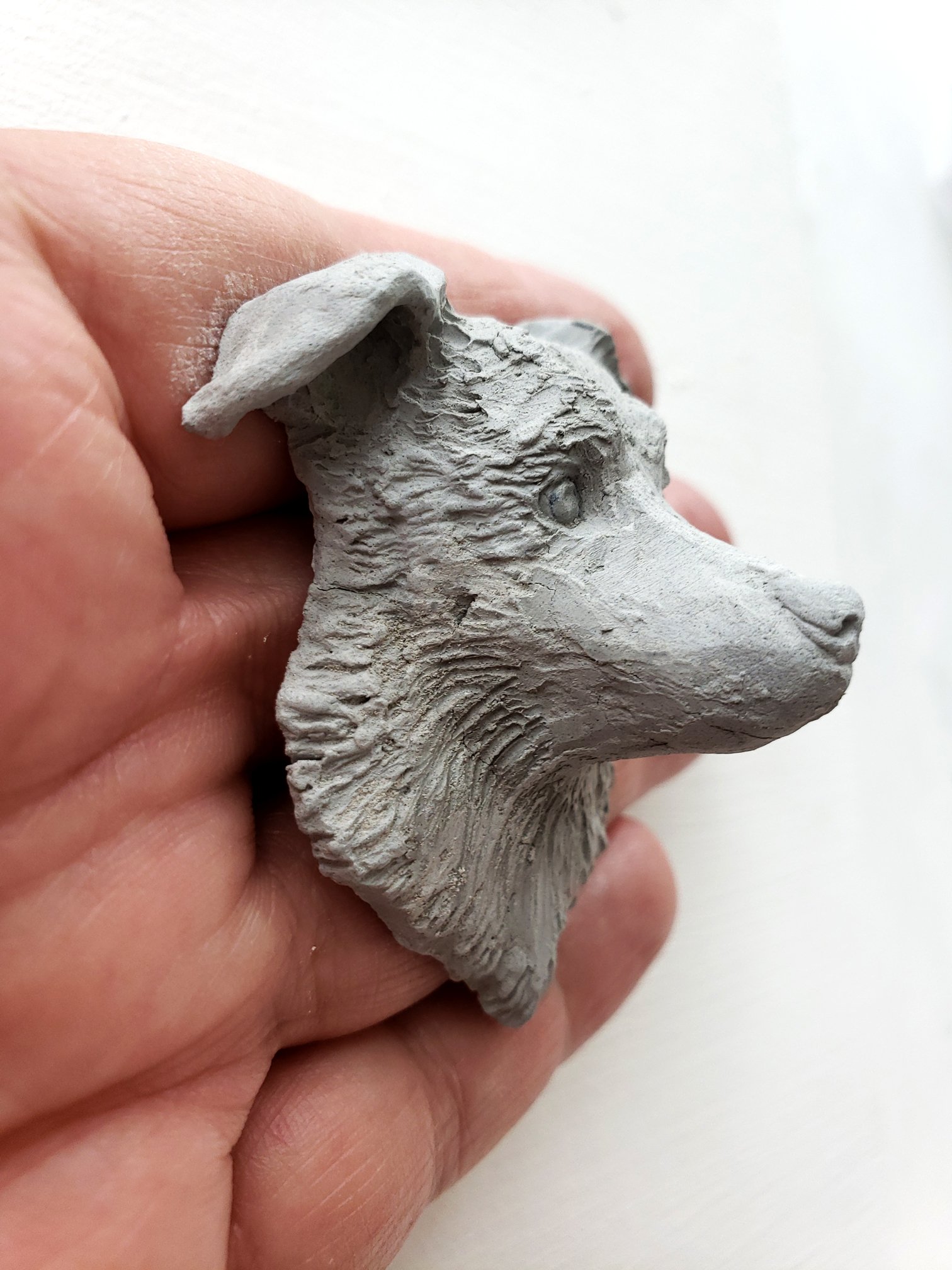 small-ceramic-dog-sculpture-in-progress-side-view-renee-fukumoto.jpg