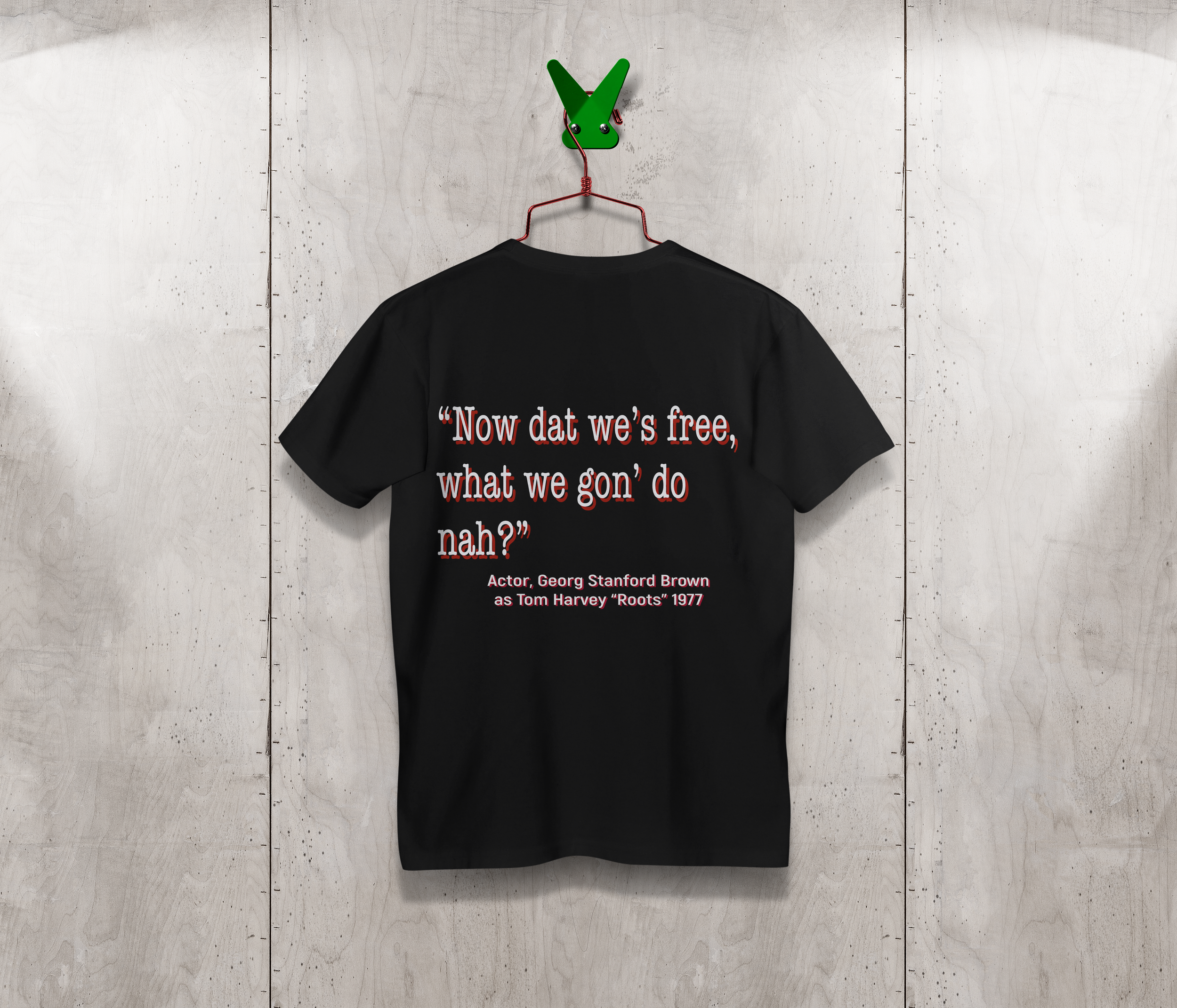 Juneteenth black t-shirt on hanger back .png
