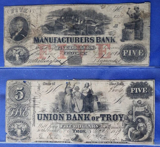 A few "obsolete notes" from Troy from the first half of the 19th century. / photo courtesy of Ferris Coin Co.