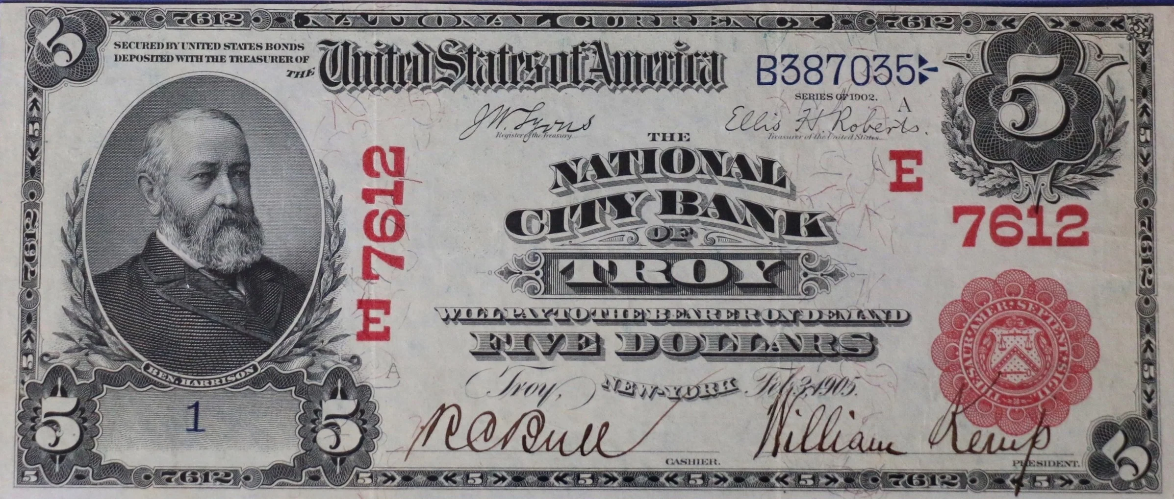 1902 $5 bill issued by The National City Bank of Troy with rare red seal, printed from plate number 1A. The note is counter signed by bank Cashier Rice C. Bull.