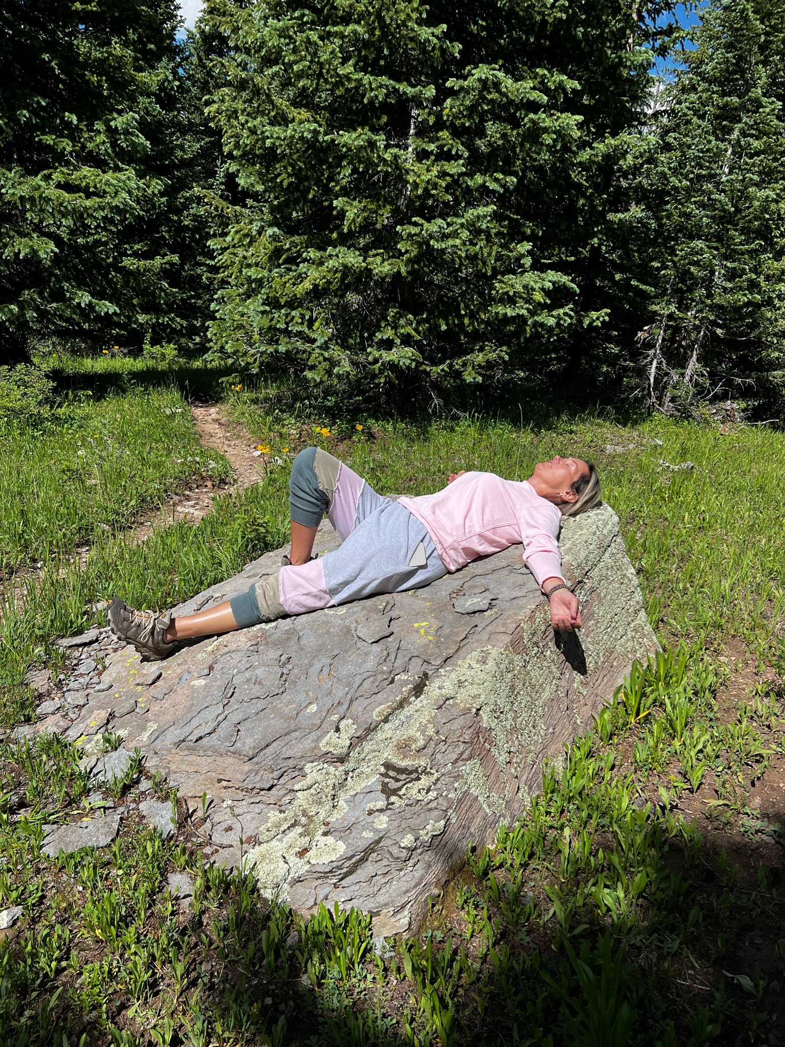 Tammy lying on rock.JPG