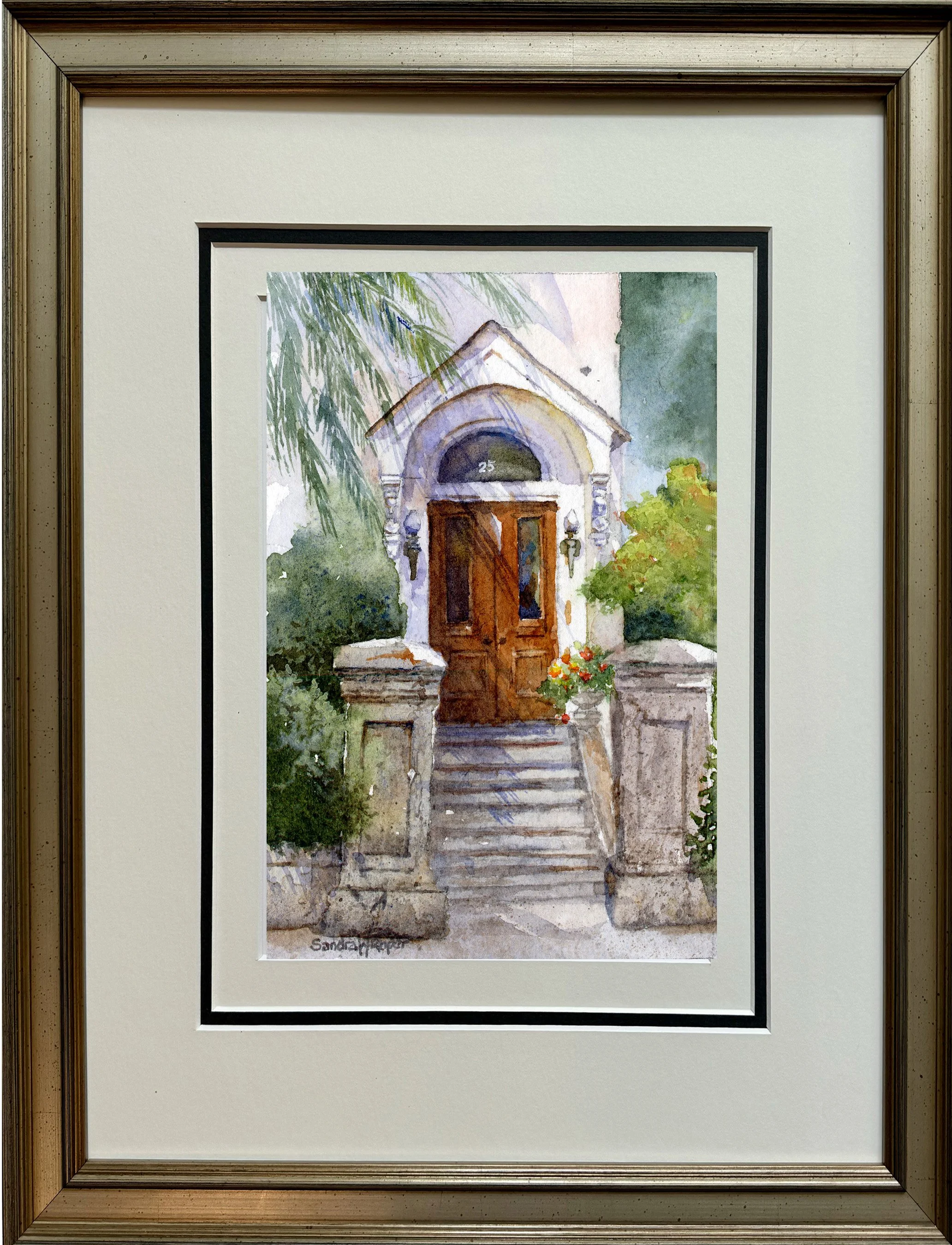  ​Framed and ready to hand, this small original watercolor captures the quiet elegance of a downtown Charleston doorway. An aging gate column, worn by centuries of coastal air, guards an arched entry doorway that welcomes you in. Perfect for adding a
