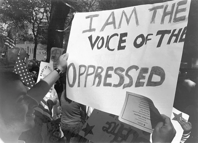 " I Am the Sign of the Oppressed " by Doug Geisler is a Creative Commons image, licensed under CC BY 2.0