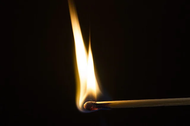 "Match Flame" by WolfBlur is a public domain image