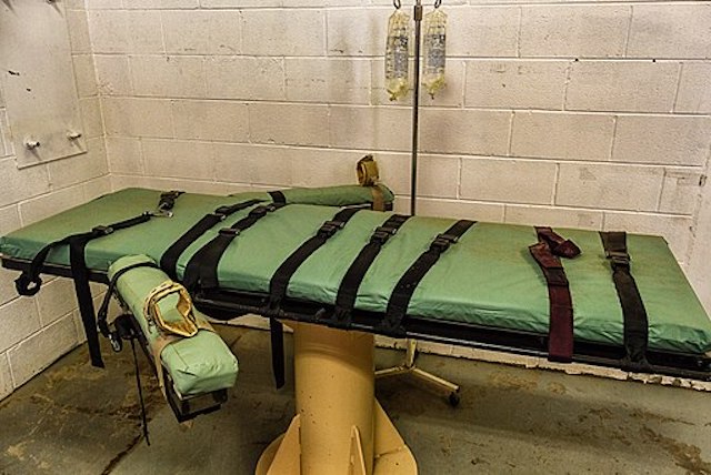 " Lethal Injection Table (11501354666) " by Ken Piorkowski is a Creative Commons image, licensed under CC BY-SA 2.0