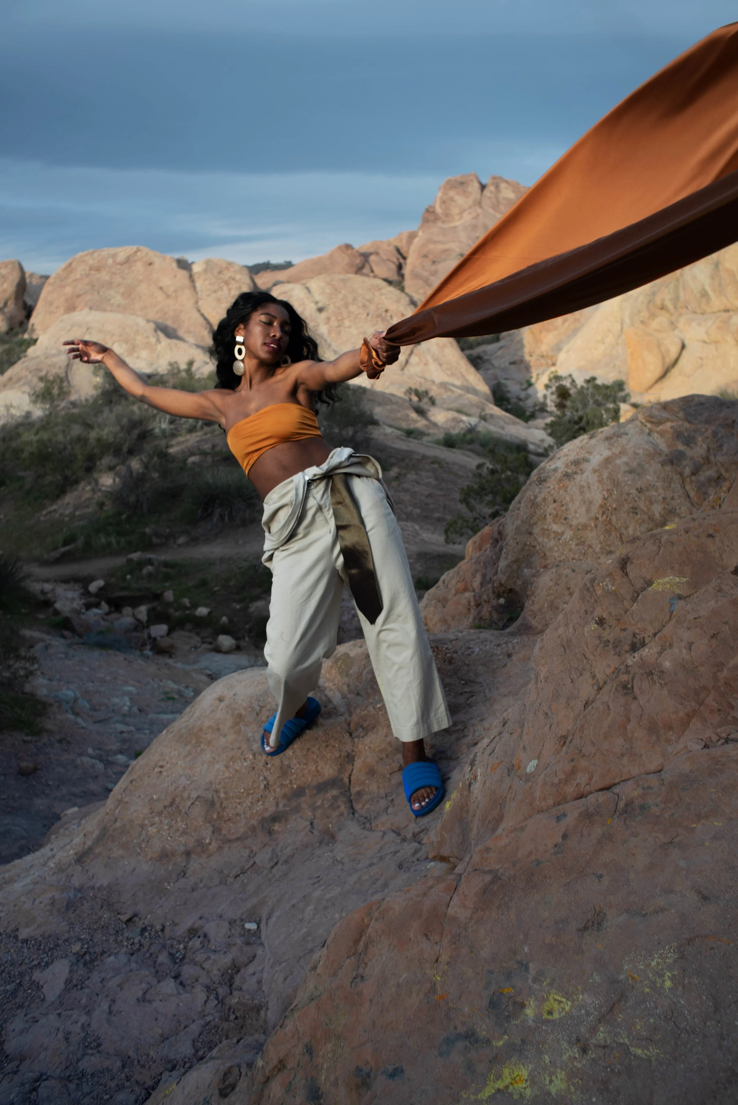   Team Credits   Photography: Graeme Aegerter  Model: Yolanda Redd  Creative Direction: T’keyah Bennett  Stylist: T’keyah Bennett  Assistant Stylist: Nandi George  Hair/Makeup: Yolanda Redd    Clothing Credits:   Statement Resin Circle Earrings - ASO