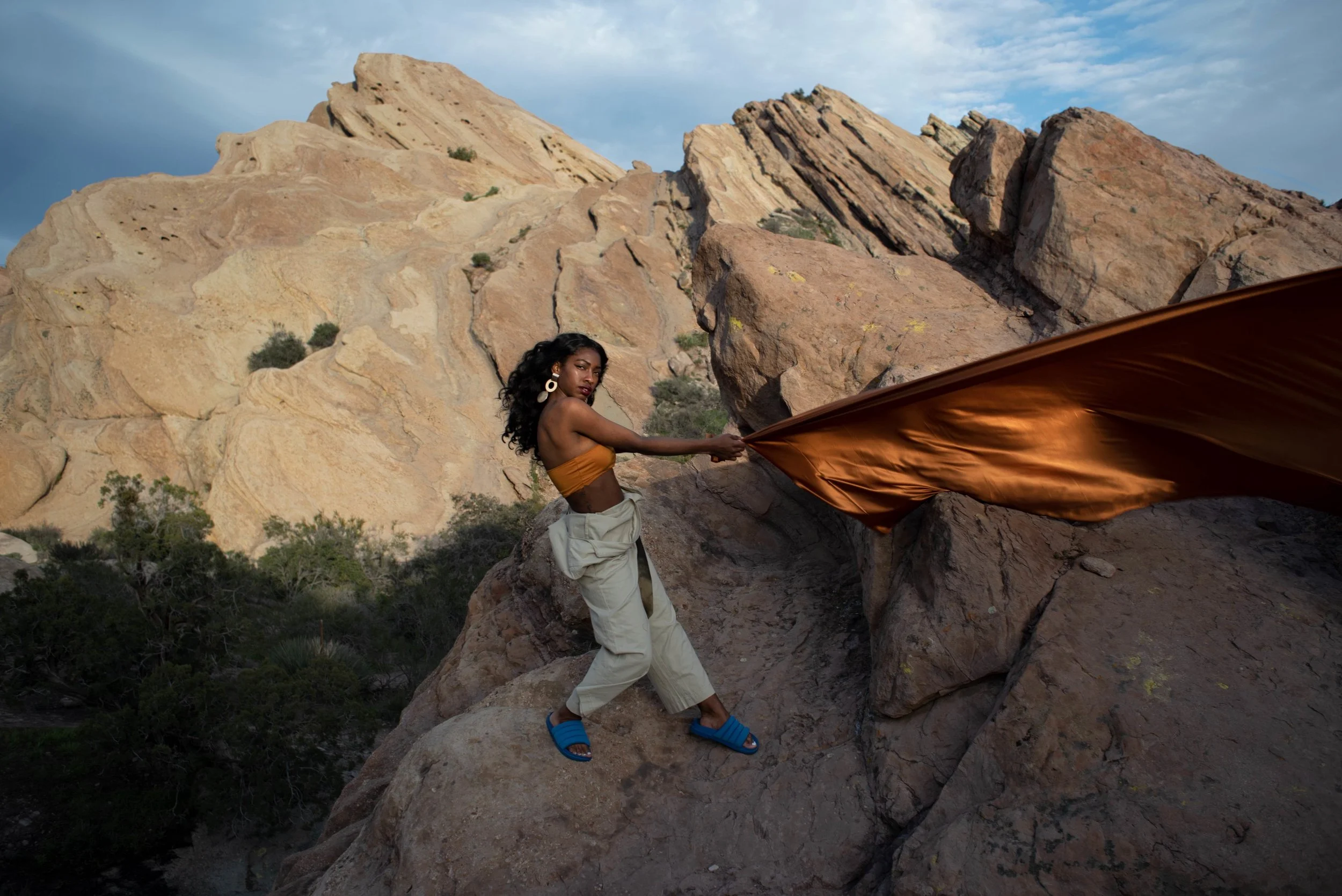   Team Credits   Photography: Graeme Aegerter  Model: Yolanda Redd  Creative Direction: T’keyah Bennett  Stylist: T’keyah Bennett  Assistant Stylist: Nandi George  Hair/Makeup: Yolanda Redd    Clothing Credits:   Statement Resin Circle Earrings - ASO