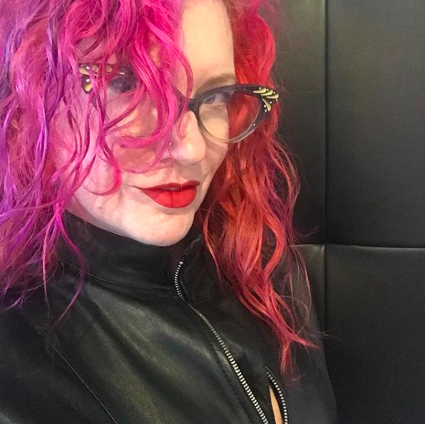 Mona Darling looking hot and mean in leather.