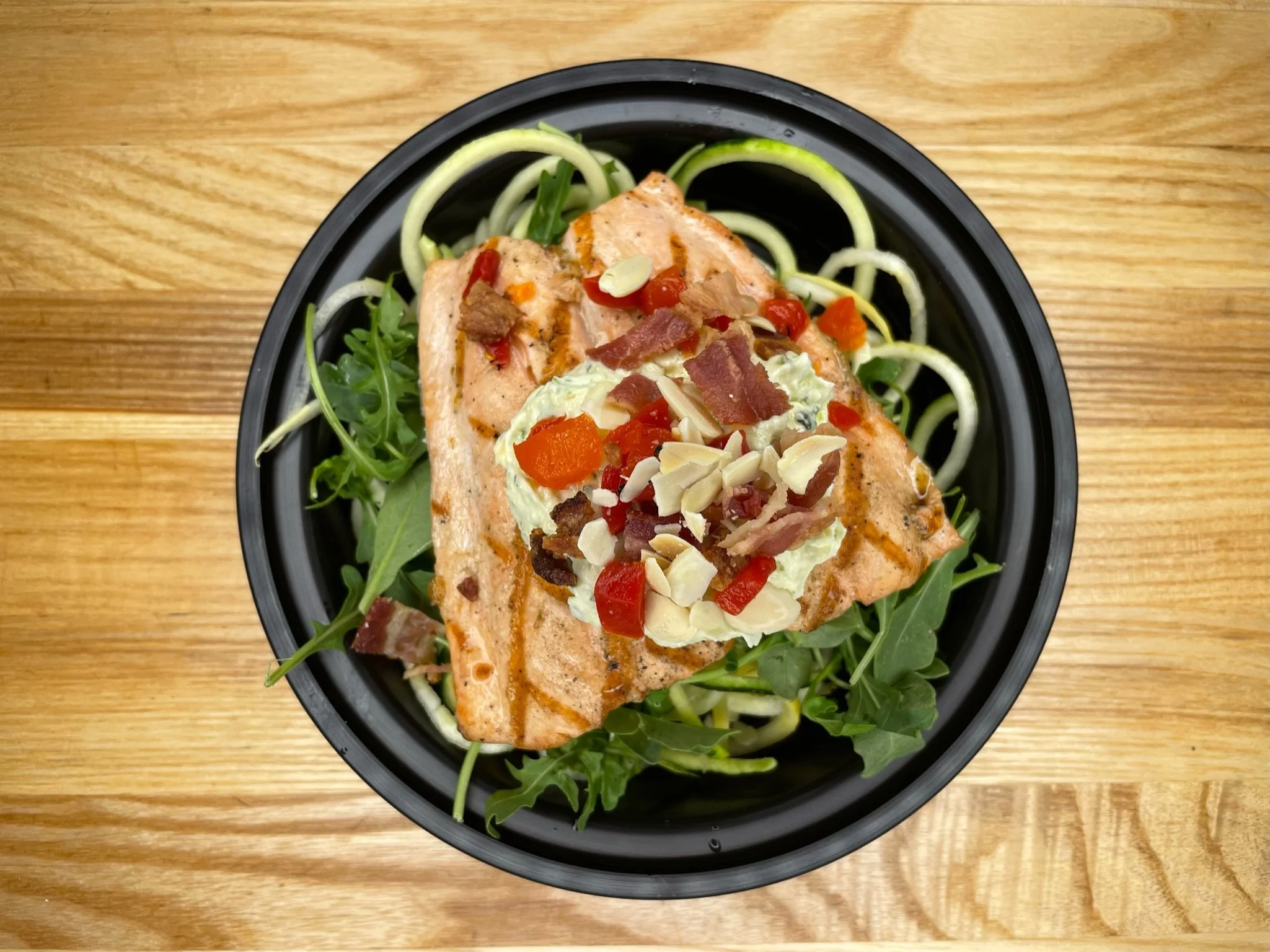 Keto Grilled Salmon, Toasted Almonds, Summer Squash Noodles, Roasted Red Peppers,  Arugula Almond Pesto Cream