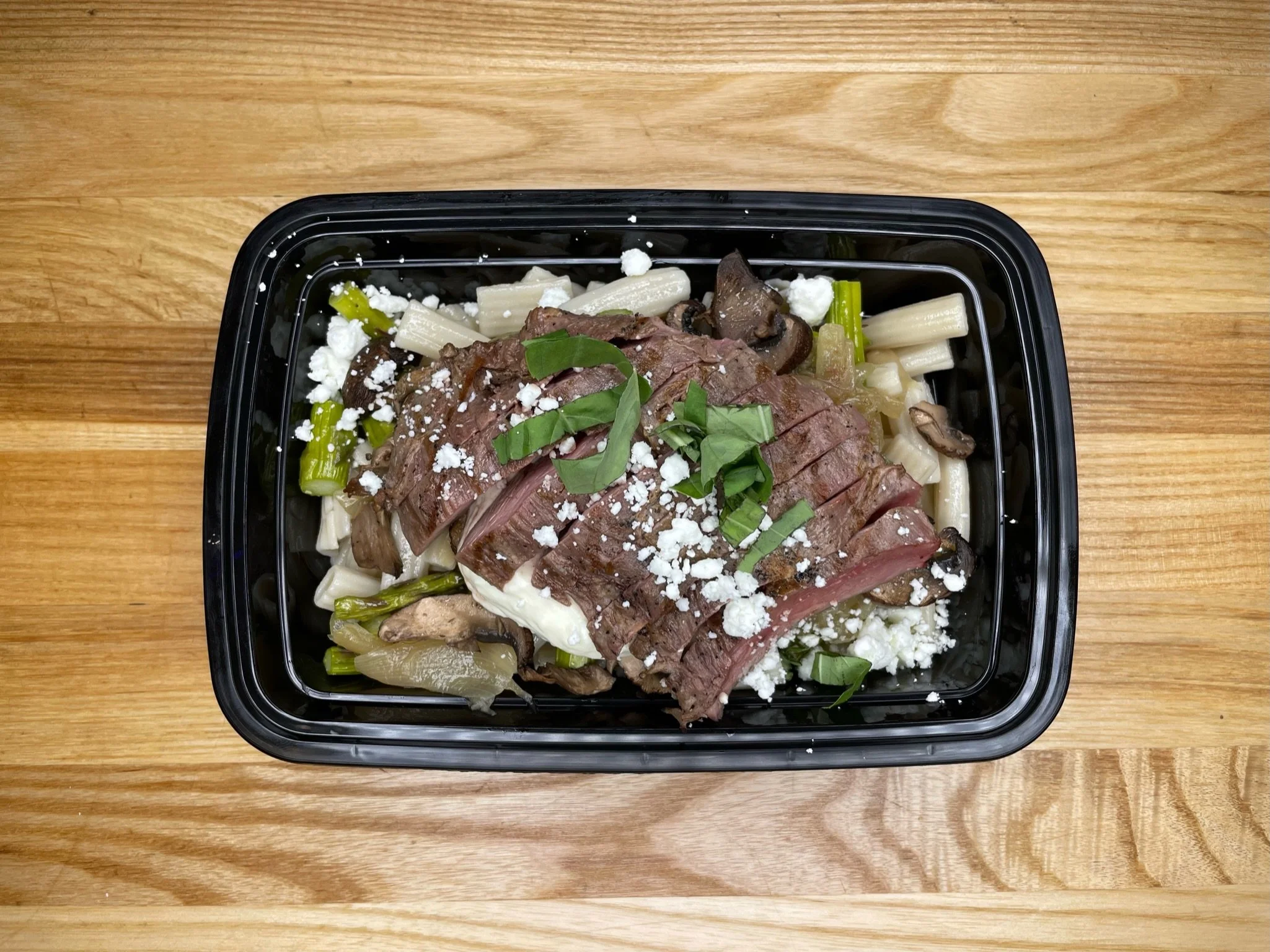 Angus Beef Tenderloin Tips & Asparagus, Gluten Free Rigatoni, Caramelized Onion, Roasted Cremini Mushrooms, Boursin Cream Sauce