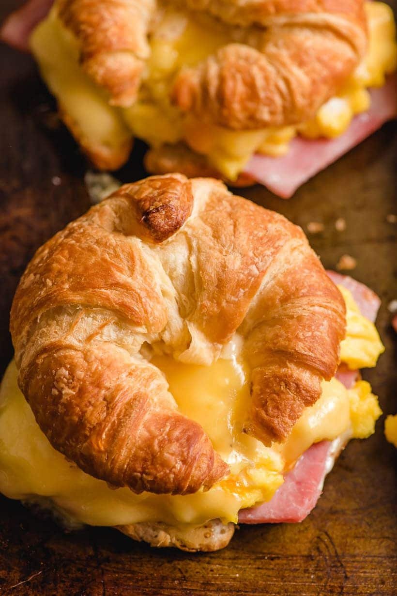 Smoked Ham, Egg & Cheddar Cheese Croissant with Yukon Gold Potato Homefries, Roasted Bell Peppers & Onion, Dijon Aioli