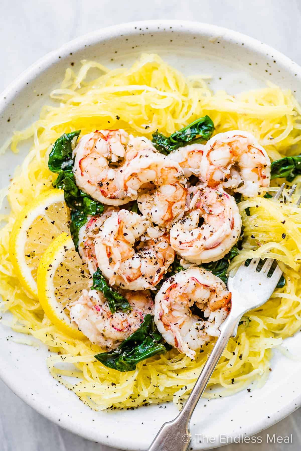 Whole30 Lemon Herb Shrimp, Roasted Spaghetti Squash, Roasted Garlic Baby Spinach, Roma Tomato, Fresh Herb & Lemon Olive Oil Sauce