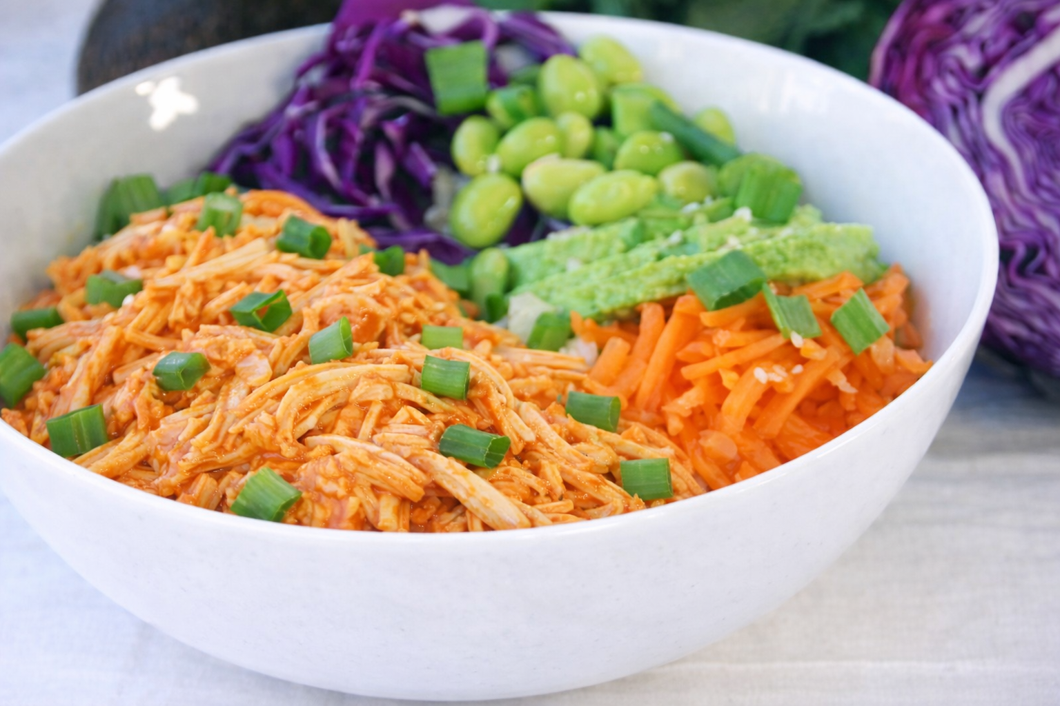 Buffalo Chicken Power Bowl- Shredded Buffalo Chicken Breast, Shelled Edamame, Shredded Purple Cabbage and Carrot, Avocado Greek Yogurt Ranch Dressing