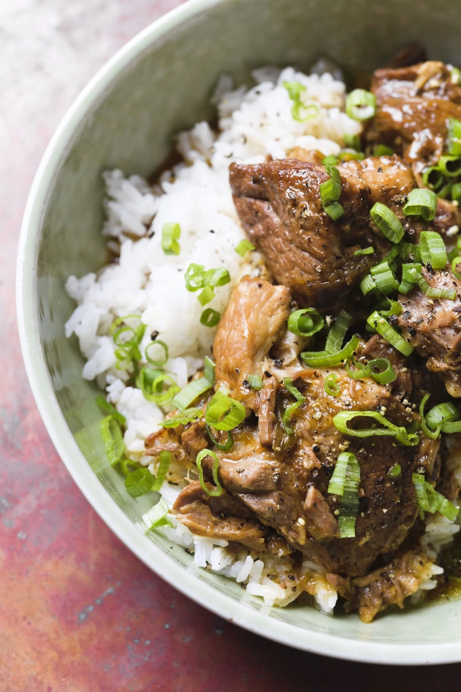 Filipino Pork Adobo, Steamed Jasmine Rice, Roasted Baby Broccolini, Scallion Garnish