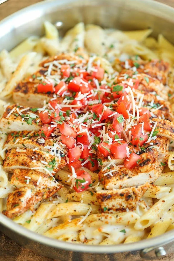 Cajun Blackened Chicken Penne, Cajun Parmesan Cream, Bell Pepper, Diced Roma Tomato, Parmesan, Penne Pasta