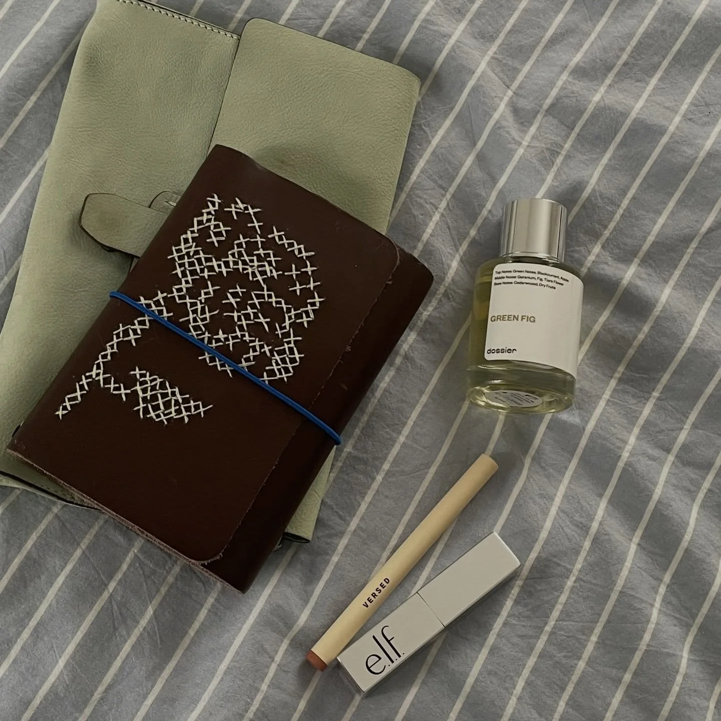 favorite things lately ~ 

🌷 vintage gap leather pouch that I found on @thredup that holds pens and various ephemera 
🌷 green fig by @dossierperfumes - the most delicious earthy spring scent that is sold out on their site (but I mercifully tracked 