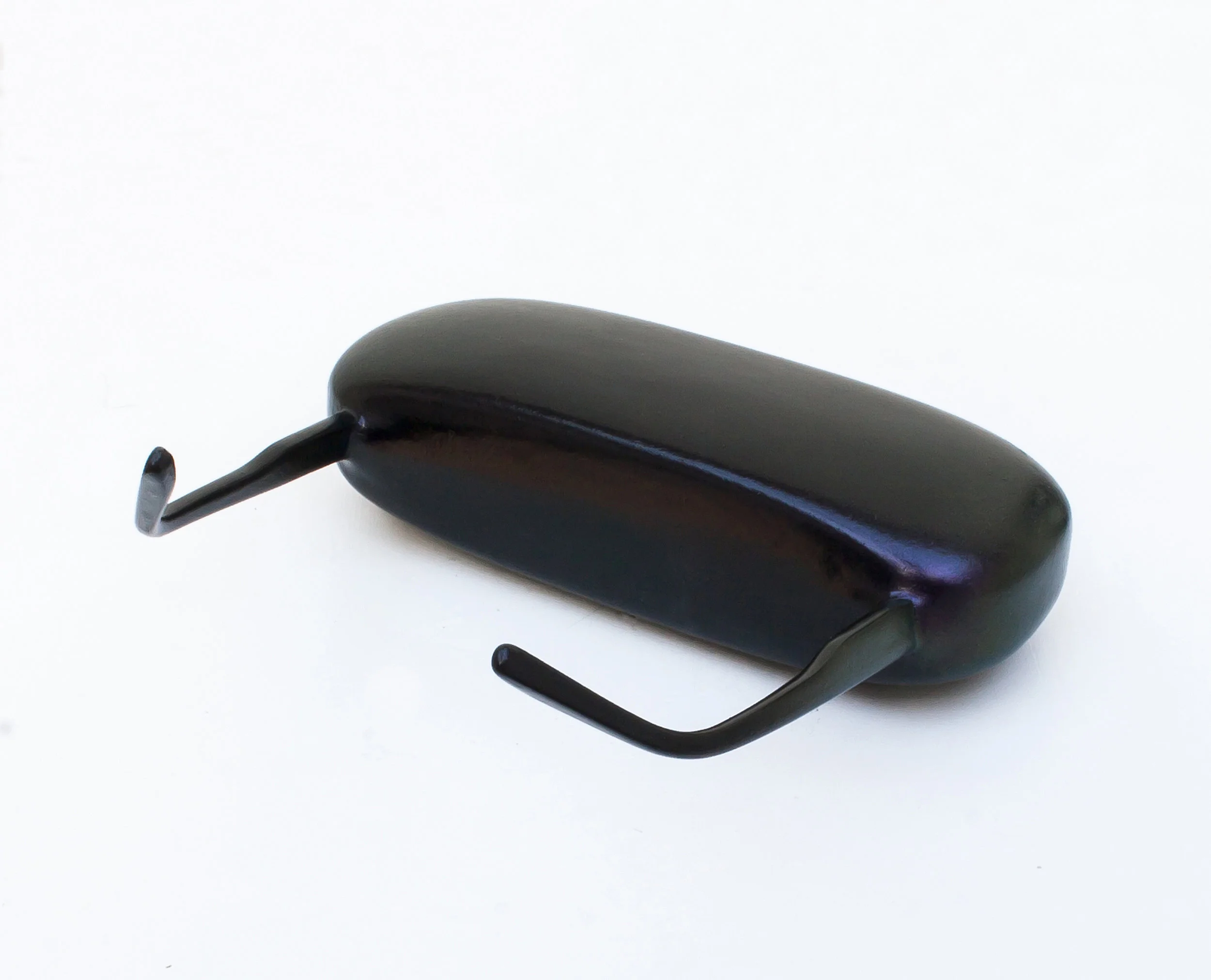 Beetle 2014 Spray enamel and iridescent paint on spectacles and case with plaster and filler, 155 x 180 x 60mm.