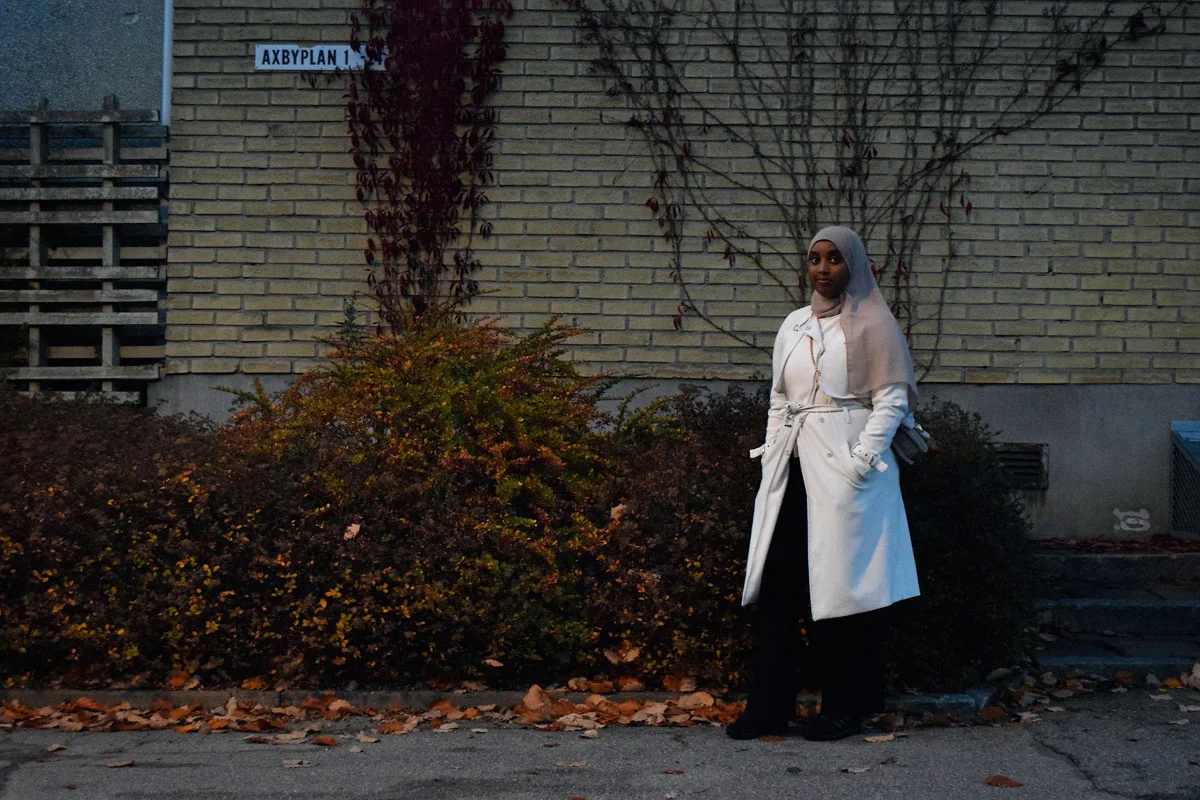 “This building looks like an old one. I decided to take my self-portrait here, it feels like the 90’s and there is something… at the time that these buildings were built, Rinkeby was a free zone, unlike now, that it is a no-go zone.”