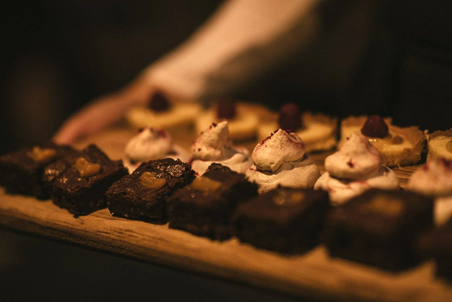 Trio of desserts on wooden boards.jpg
