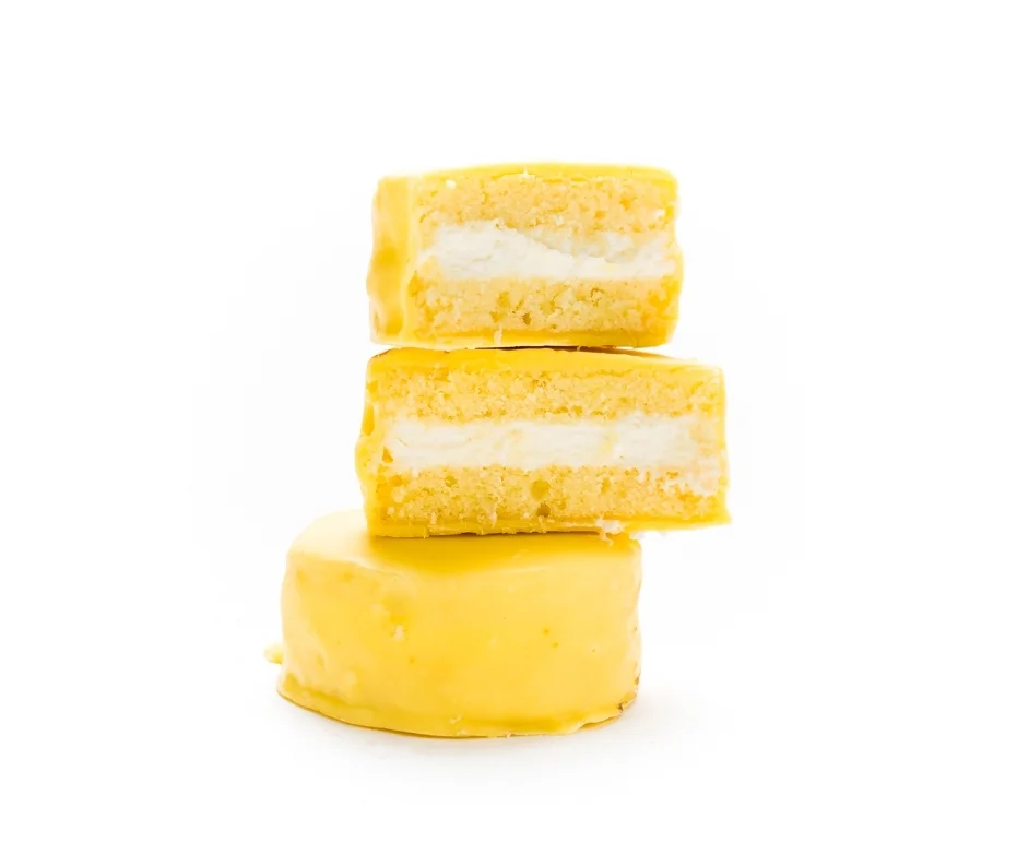 Lemon Creme (Nut free) When life gives us lemons… we make a Ring Ding. Lemon cake and white chocolate cream fill yell-tinted chocolate shell in this tantalizingly tart addition to snack cake canon!