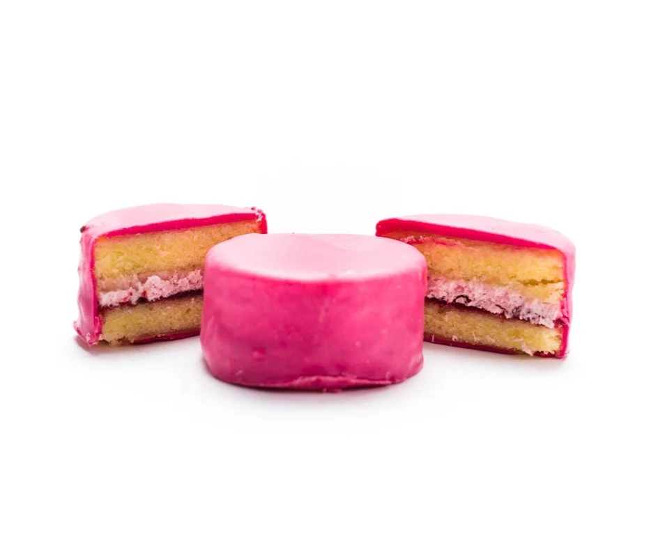 Red Raspberry Pink chocolate and vanilla cake surround a gooey center of seedless seasonal raspberry jam and tangy raspberry cream filling. A very tart tart ;)