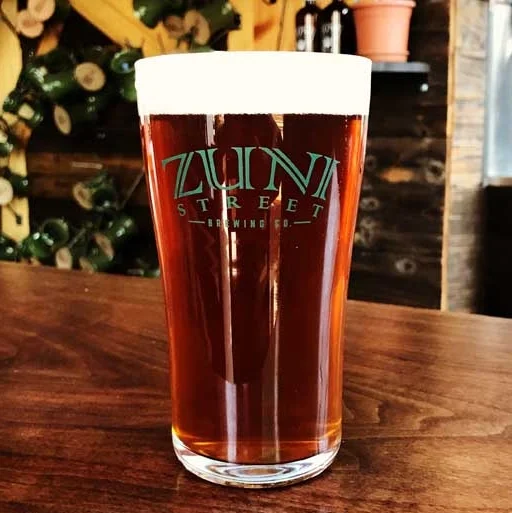 JUSTIN'S EASY GOING AMBER ABV: 5% IBU: 17 A full bodied amber ale, accented with hints of caramel, nuts, and fresh cut bread. As Justin would say, “This here’s a comfort beer.”
