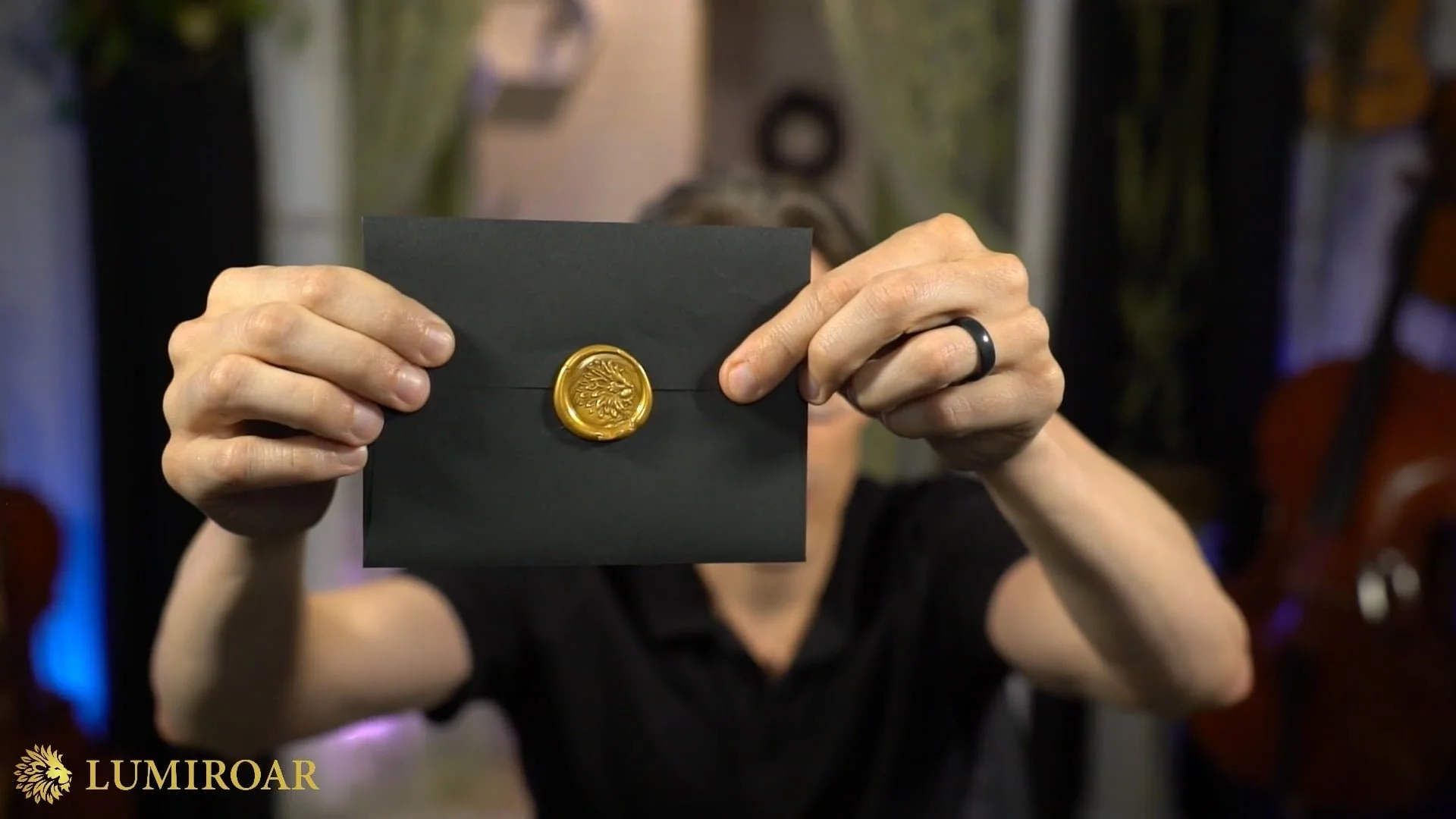 Michael Linert showing the Lyriwave wax seal on the inner envelope.