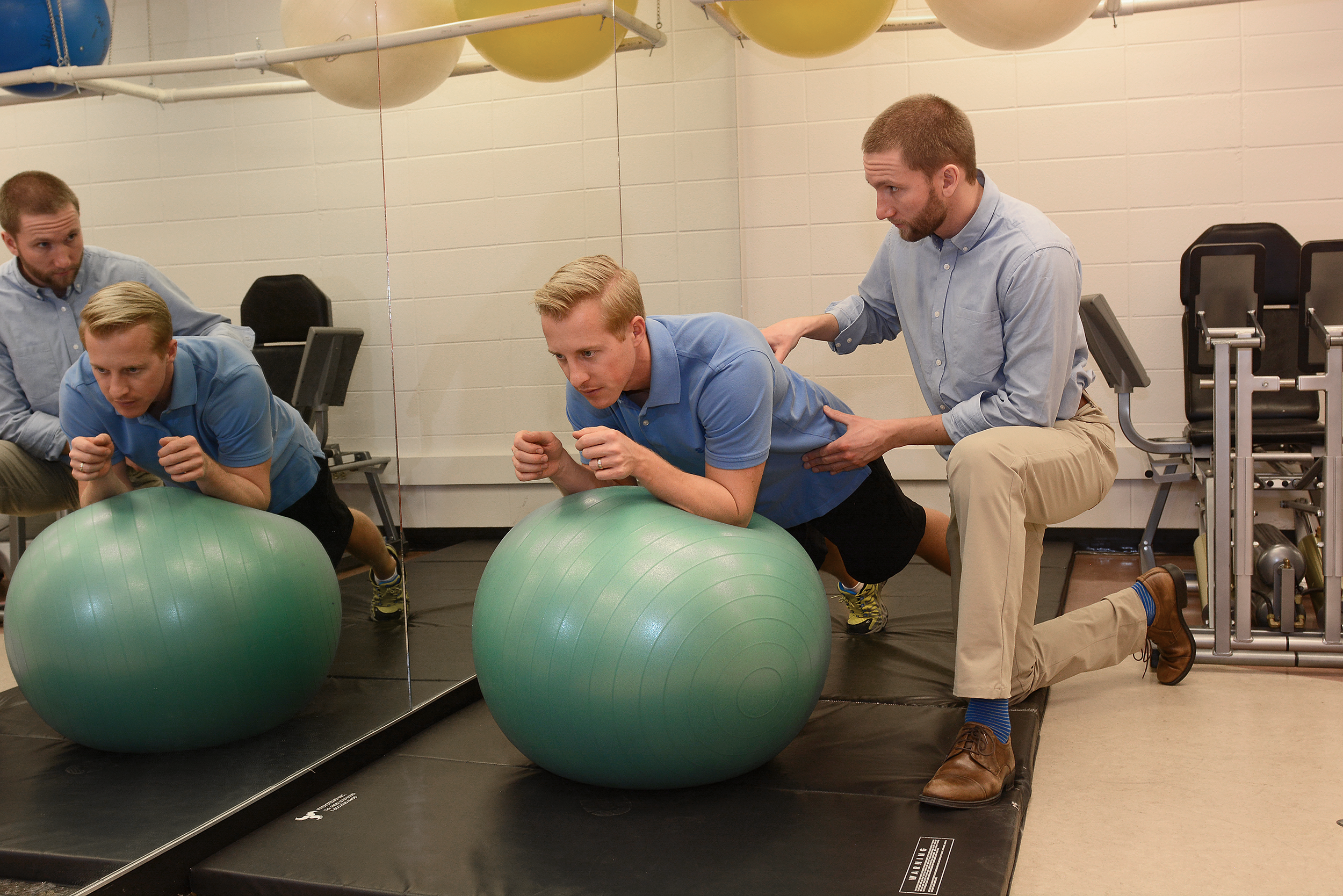 John Roberts physiotherapy_plank on ball.png