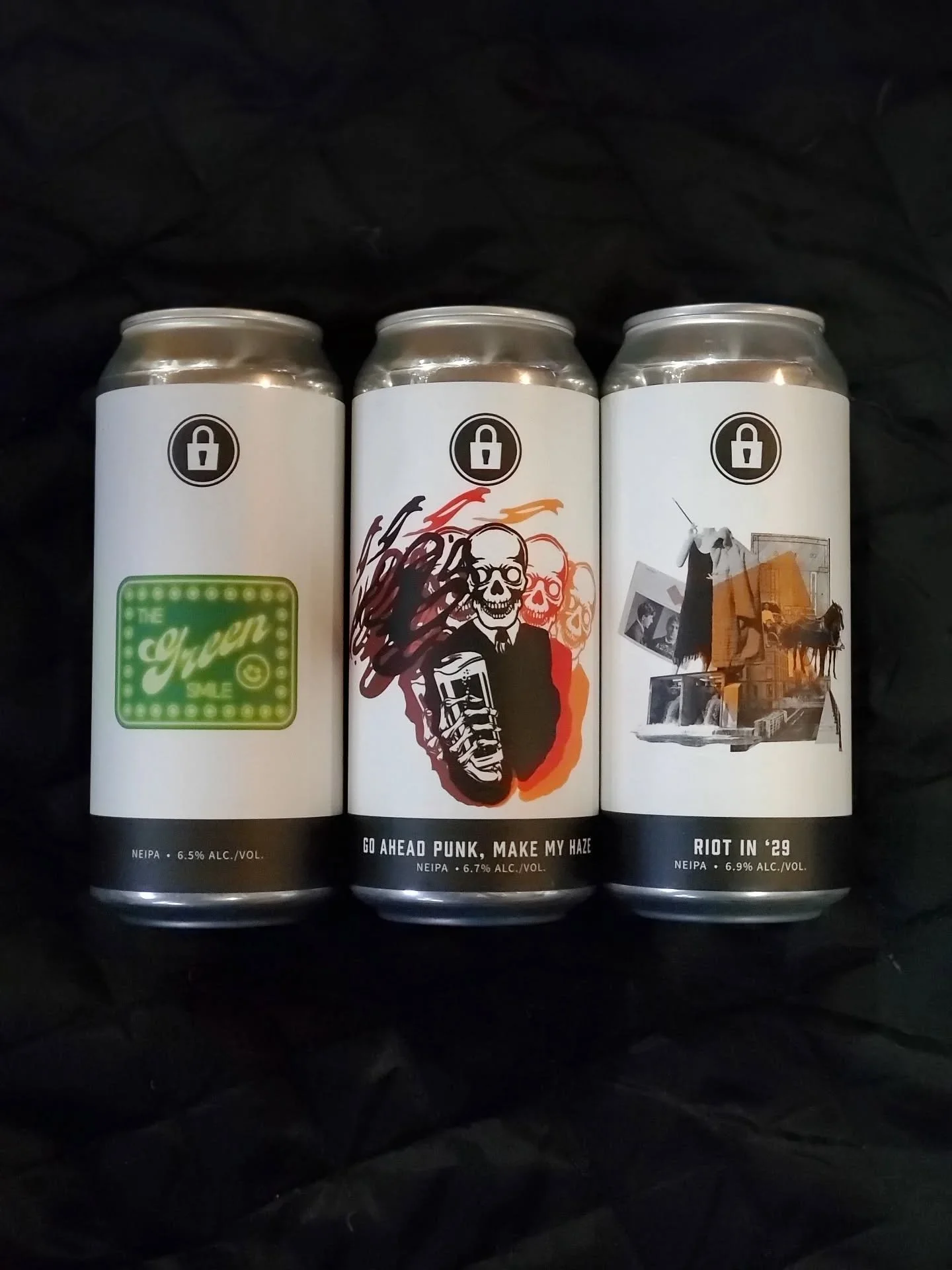 It's been a minute since we've seen these brews from Prison City! Three different NEIPAs:
&bull;The Green Smile (Simcoe, Mosaic, Citra, and Galaxy)
&bull;Go Ahead Punk, Make My Haze (Citra, and Galaxy)
&bull;Riot In '29 (Citra, Hallertau Blanc, and C