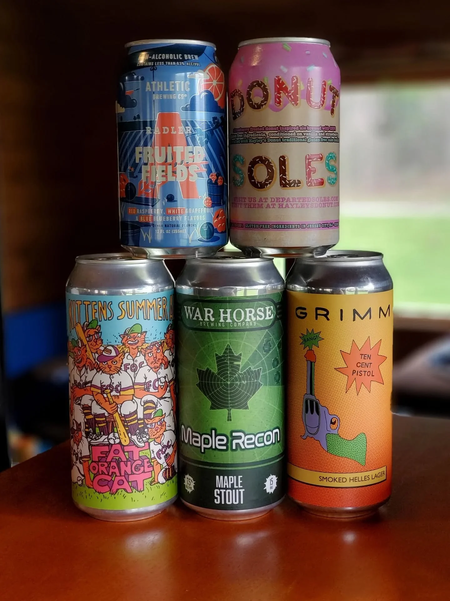 New arrivals! From left to right, top to bottom:

&bull;Athletic Fruited Fields - non-alcoholic red white &amp; blue raspberry radler
&bull;Departed Soles Donut Soles - gluten free strawberry frosted donut ale
&bull;Fat Orange Cat Kittens Summer Ale
