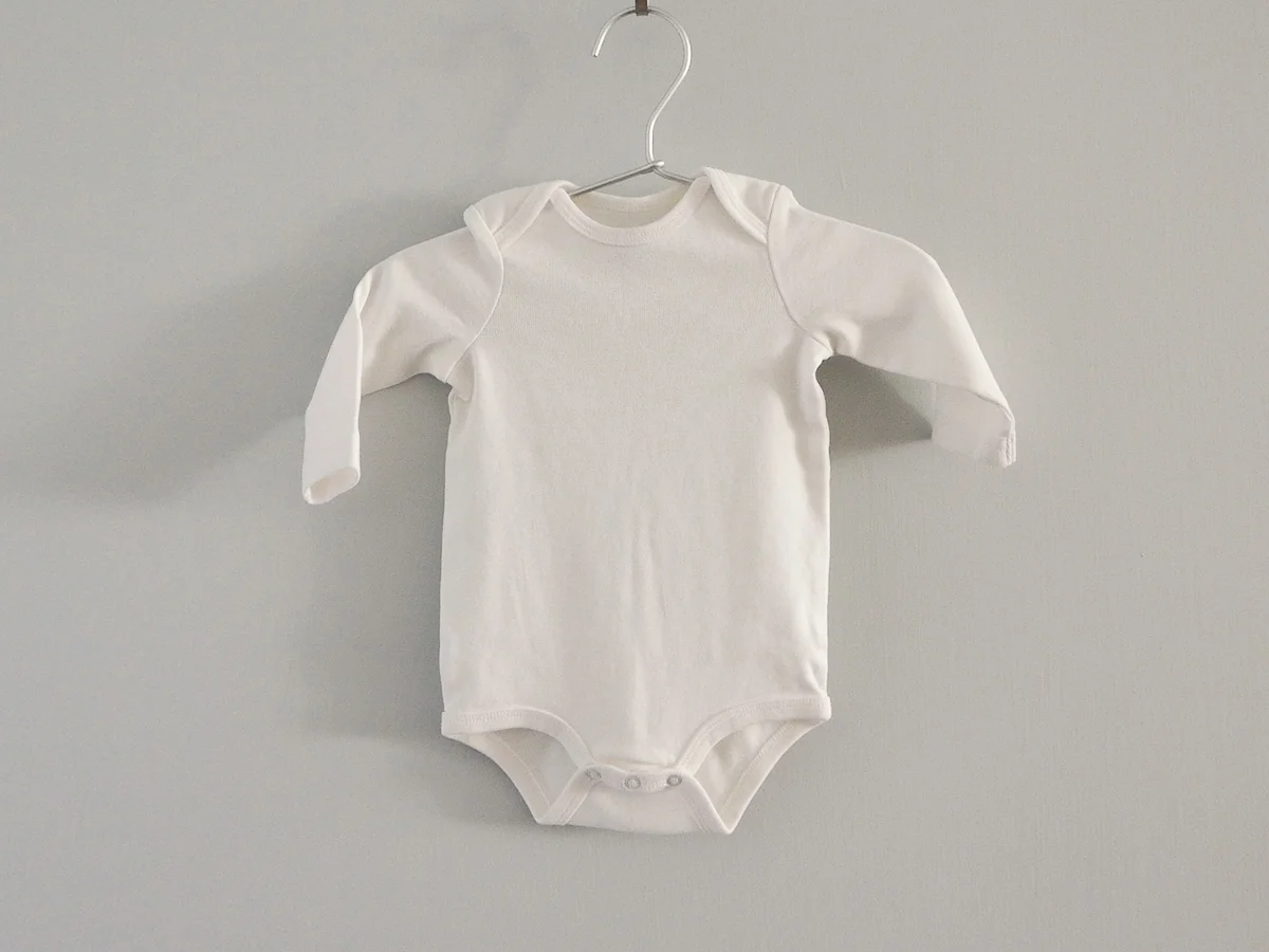 cream long sleeve onesie