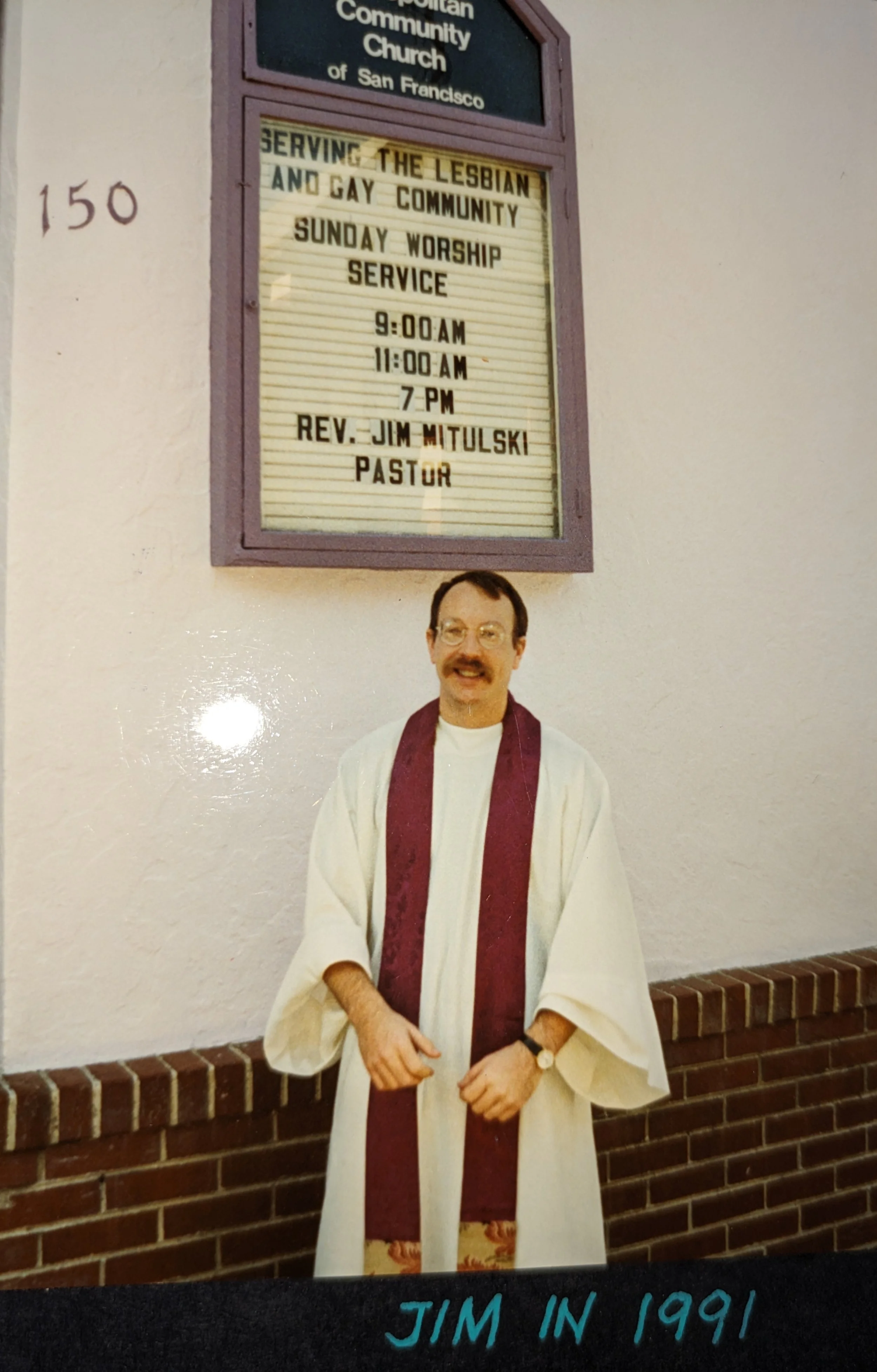  Rev. Jim MItulski in front of 150 Eureka Street, 1991. Courtesy of Rev. Jim Mitulski.&nbsp; 