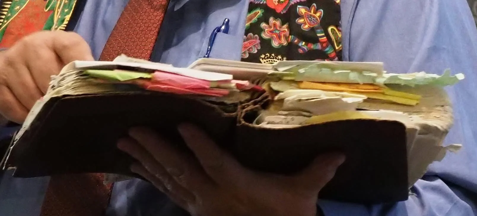  Rev Jim Mitulski holding his preaching Bible. Courtesy of Rev. Jim Mitulski. 