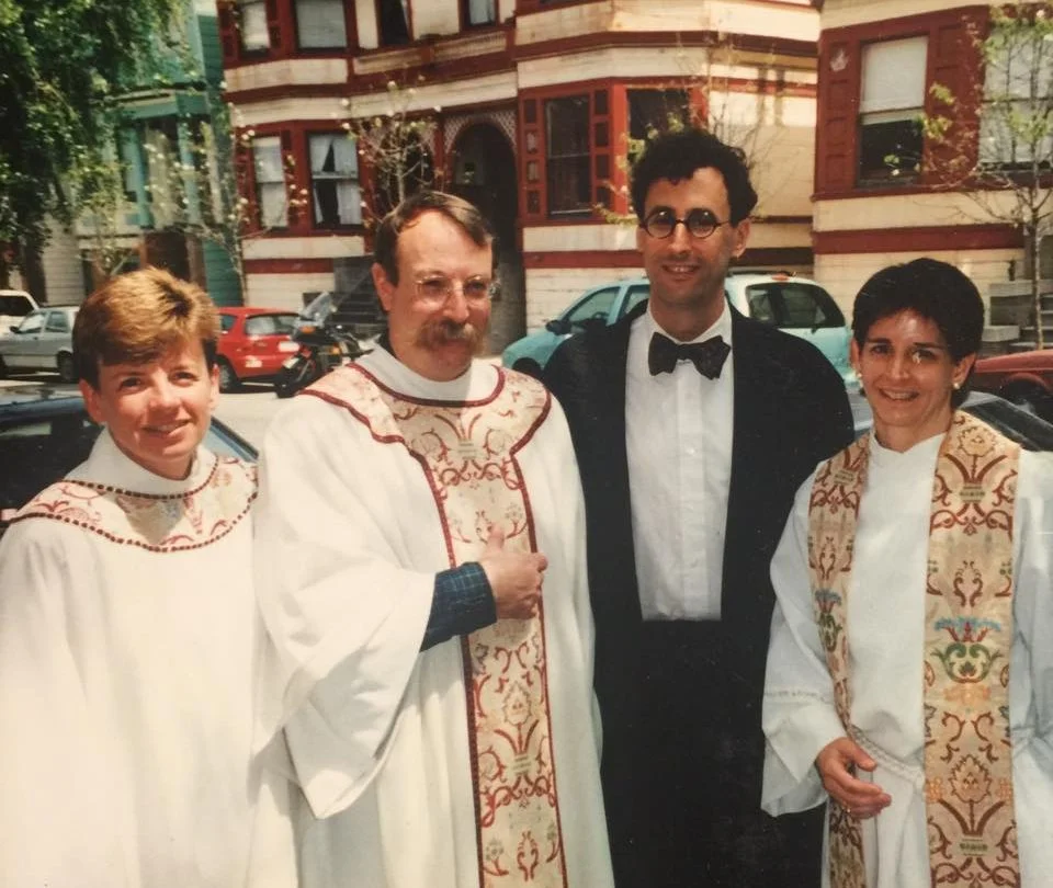  Left to right – Rev. Penny Nixon, Rev. Jim Mitulski, Tony Kushner, Rev. Karen Foster. April 26, 1998. Courtesy of the MCC San Francisco Collection, San Francisco Public Library.&nbsp; 